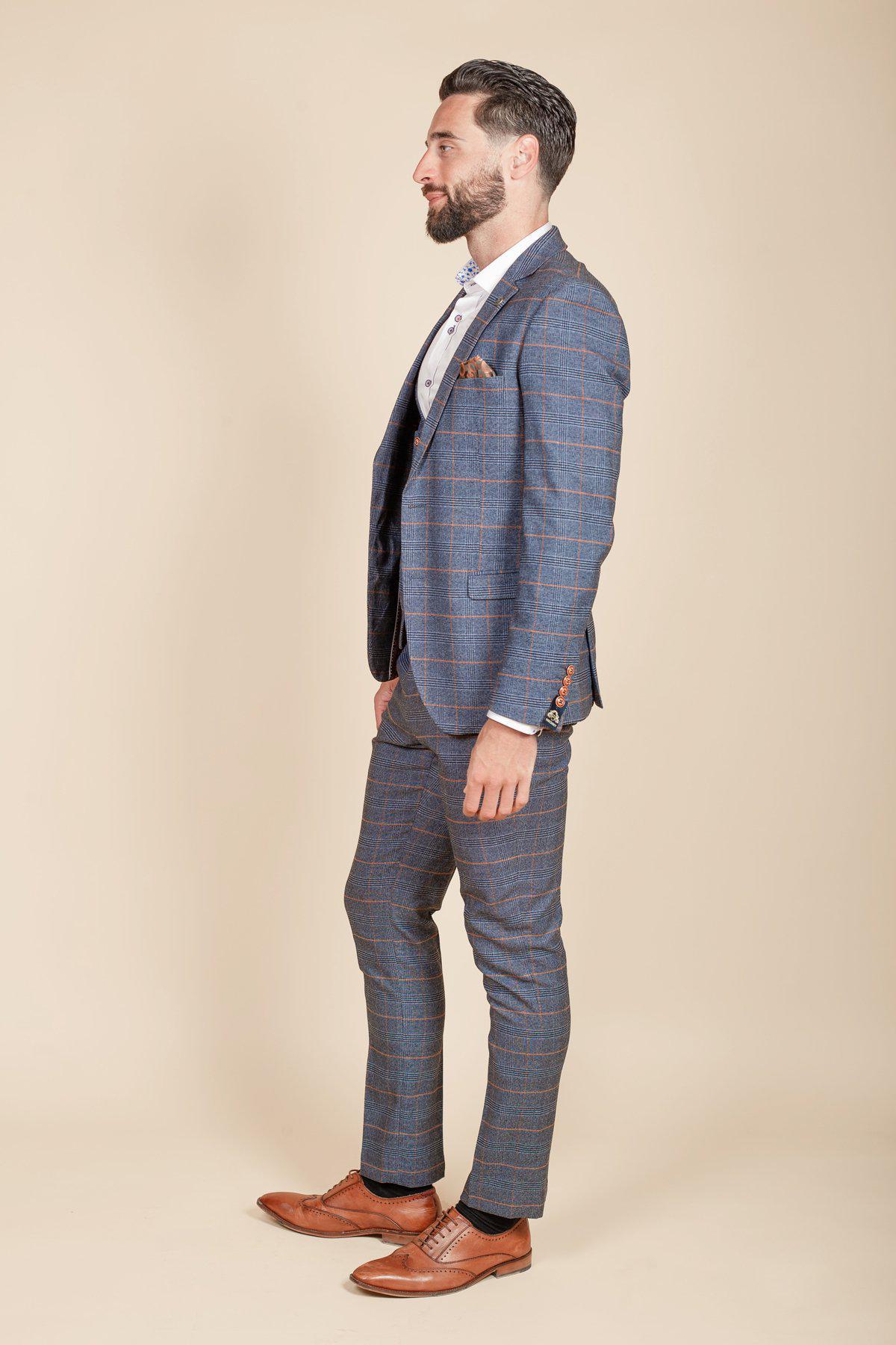 Former Footballer Clinton Morrison in Jenson Sky Blue Check Suit - Stylish Men's Formal Wear for Weddings, Parties & Business Events