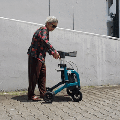 HappyWheels Lightweight Travel Rollator Walker with Seat - Foldable Mobility Aid for Seniors & Adults - Perfect for Airports, Shopping & Outdoor Use