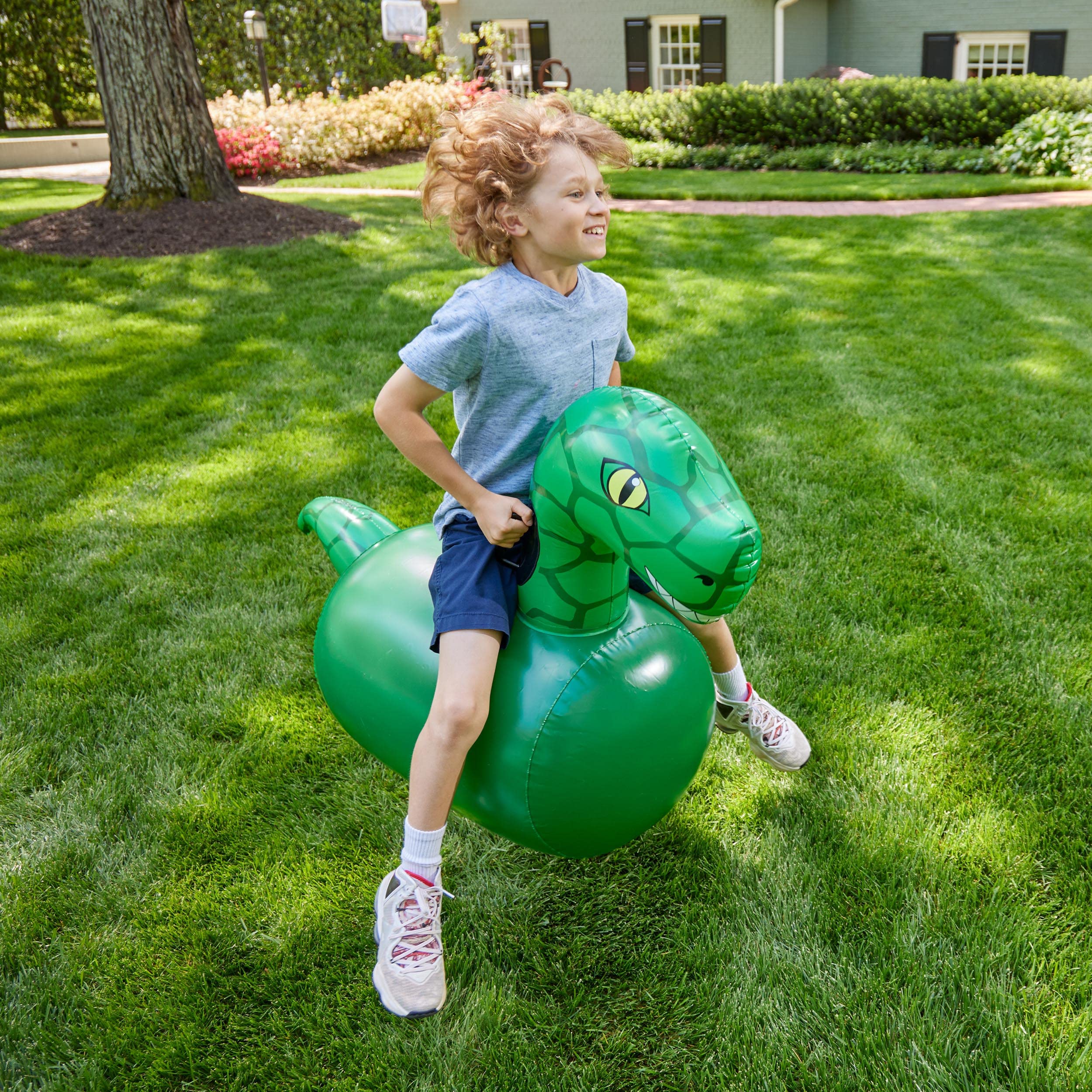 **Hearthsong Hop N Go Inflatable Dinosaur Ride-On Bouncer for Kids Ages 5+ - Outdoor Jumping Toy, Dino Hopper for Backyard Play, Birthday Parties & Active Playtime**