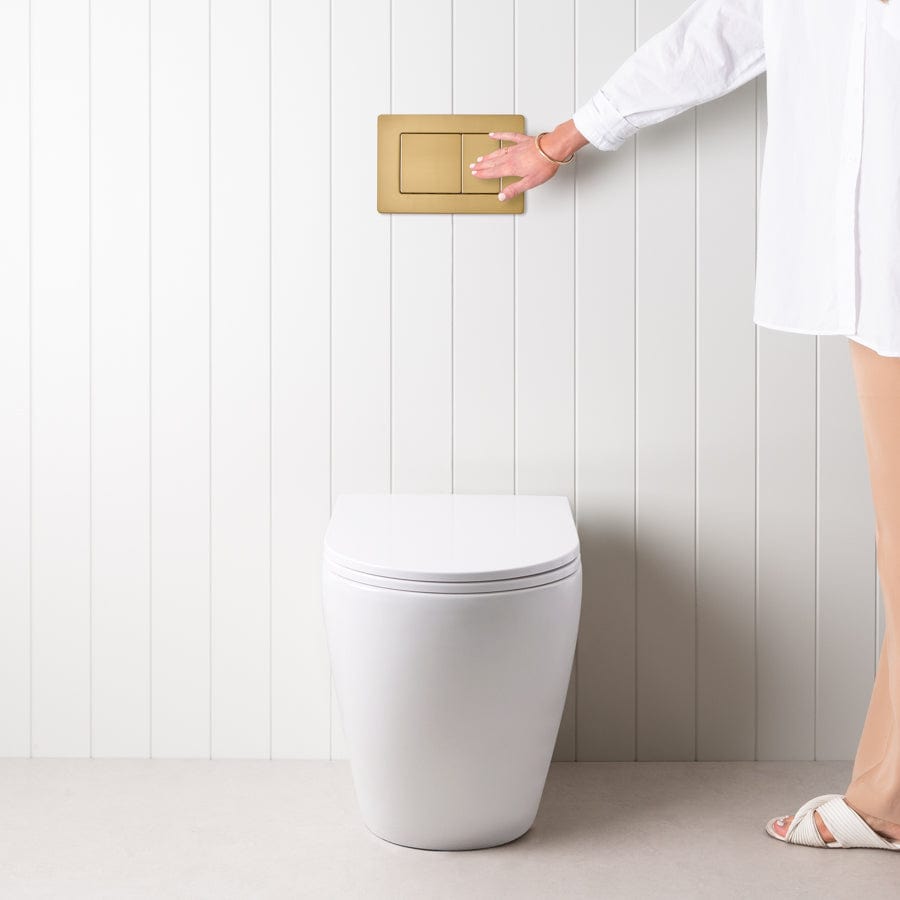 Elegant Curved In-Wall Toilet with Rectangle Brushed Brass Buttons - Modern Water-Saving Bathroom Solution for Home & Commercial Spaces