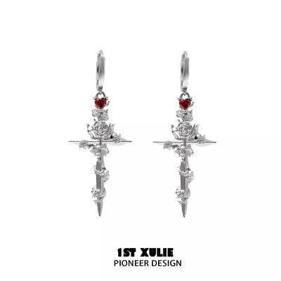 1 pair of silver earrings