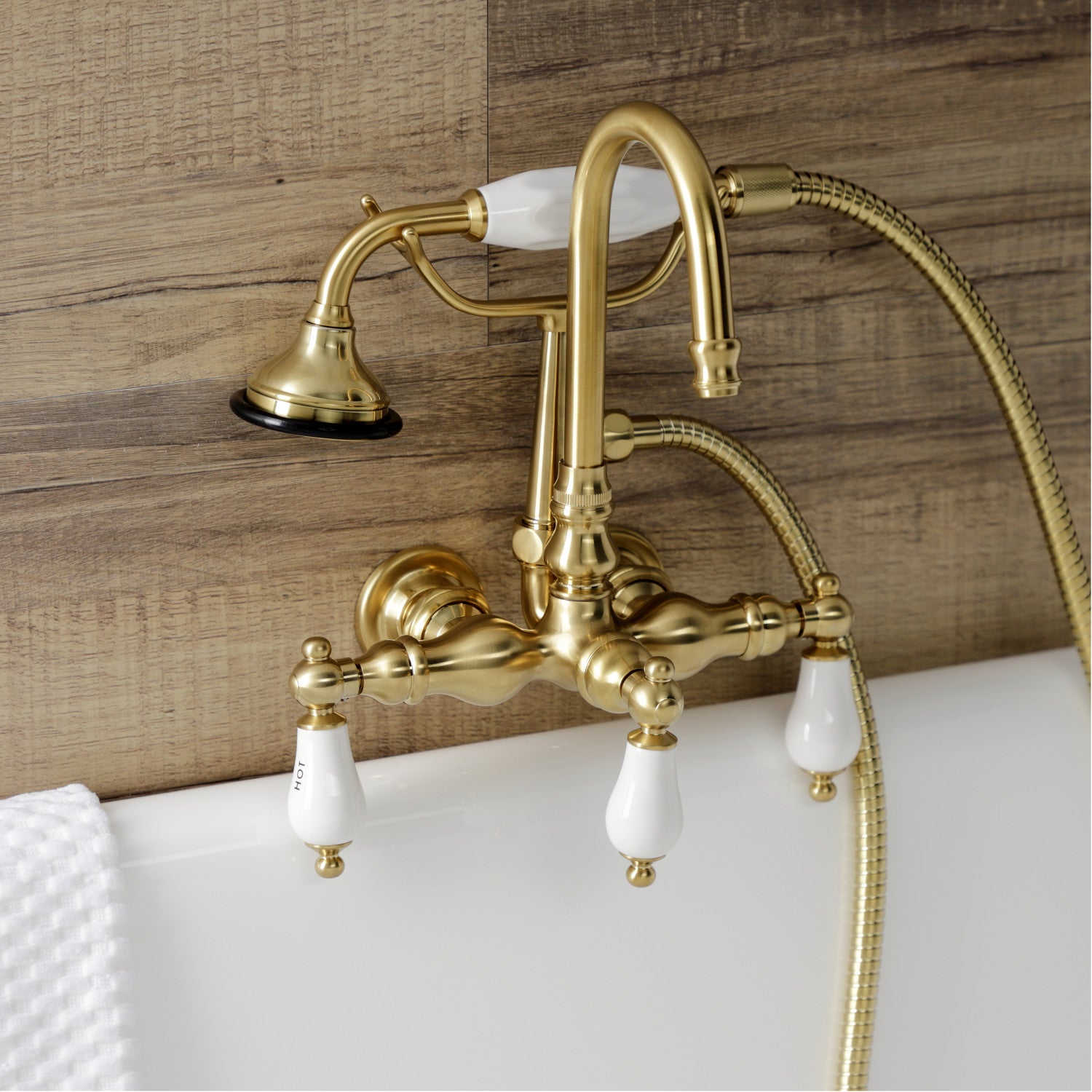 Vintage Style 3-Handle Wall Mount Clawfoot Tub Faucet with Hand Shower in Brushed Brass - Perfect for Bathroom Renovation & Luxury Spa Experience