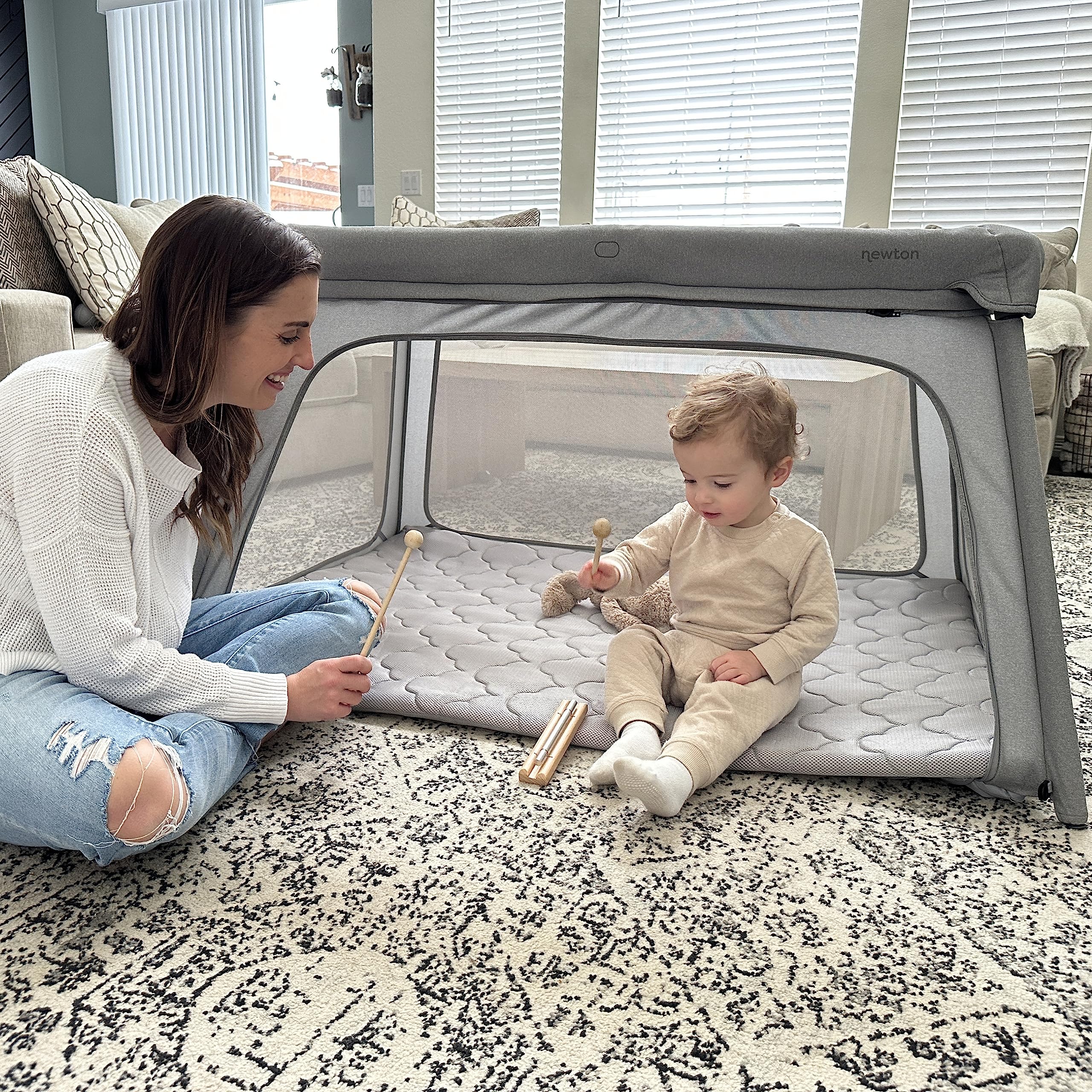 Newton Baby Travel Crib & Play Yard - 2023 Model | 100% Breathable Washable Portable Playpen | Largest Baby Playard with Travel Bag & Sheet | Bassinet Option | Perfect for Travel, Nursery & Indoor Playtime