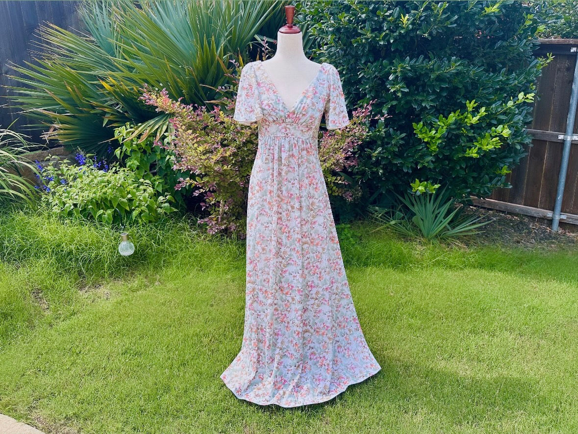 Vintage 1960s Orange & Pink Floral Maxi Dress - Nancy G Flower Empire Waist V-Neck Summer Long Dress with Flutter Sleeves | Retro Boho Chic Outfit for Beach Wedding, Music Festival & Vintage Theme Party
