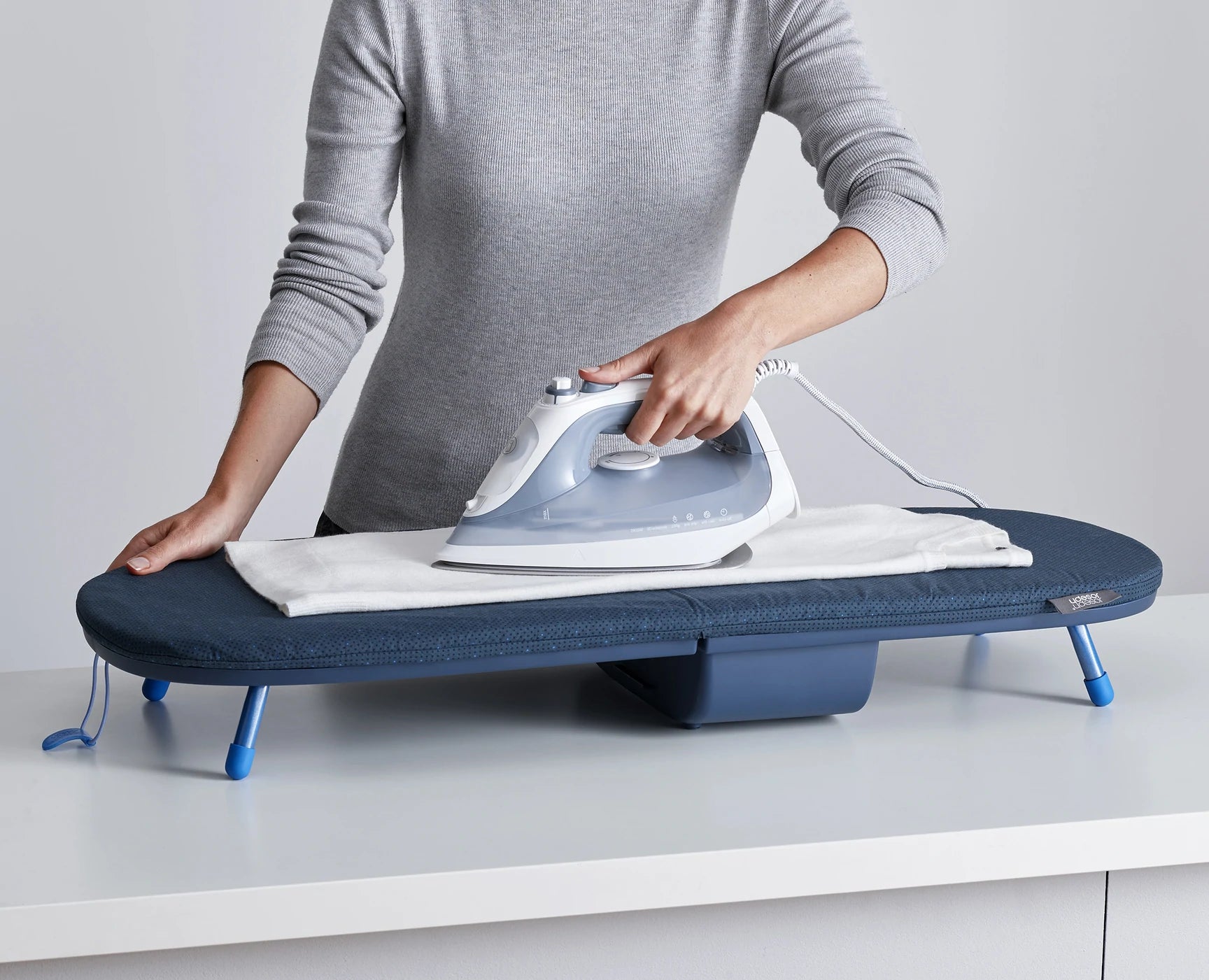 Portable Folding Ironing Board with Heat-Resistant Cover - Compact & Space-Saving Design for Travel, Dorm, or Small Apartments