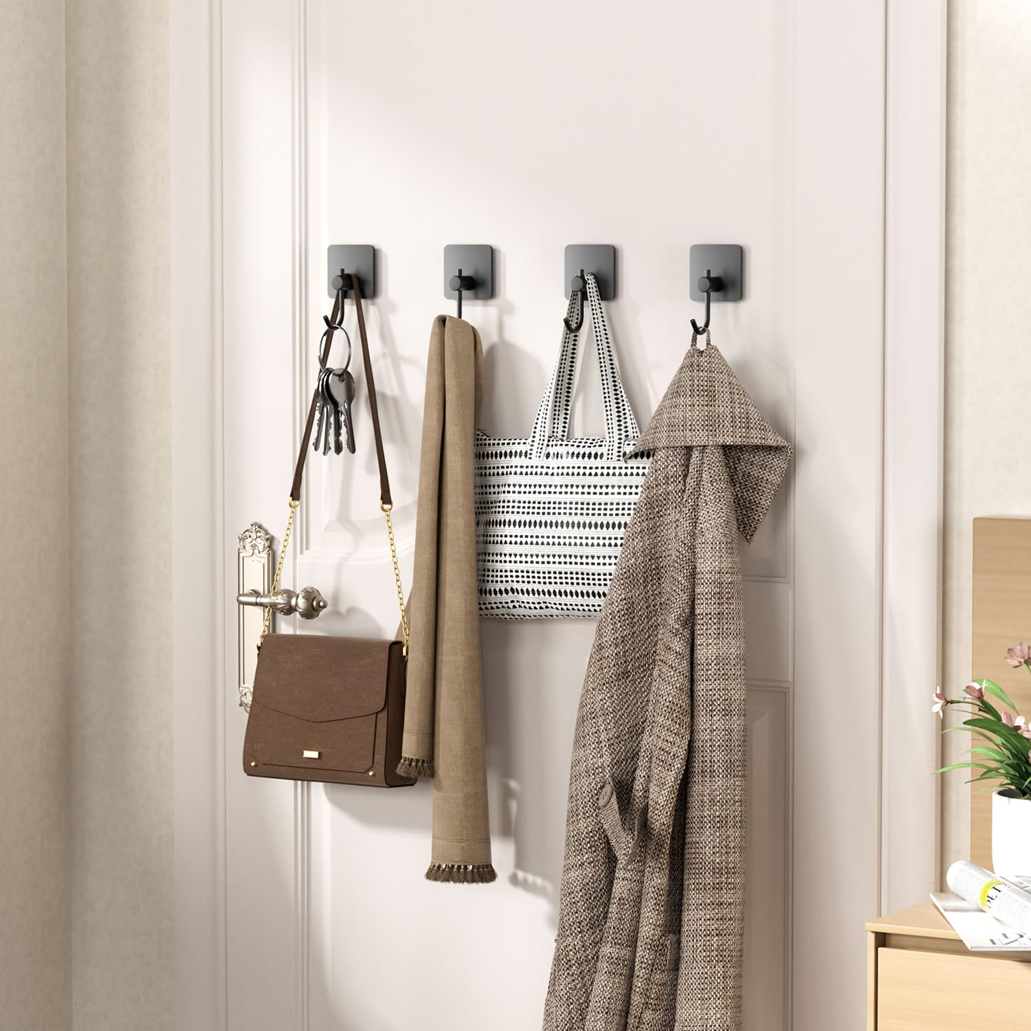 Self Adhesive Towel Hooks for Bathroom - 4 Pack Black Wall Mounted Hooks, Strong Adhesive Hand Towel Holder for Hanging Bath Towels, Robes & Lightweight Clothing - Perfect for Bathroom, Closet, Cabinet & Behind Doors (Ideal for Small Spaces & Organization)