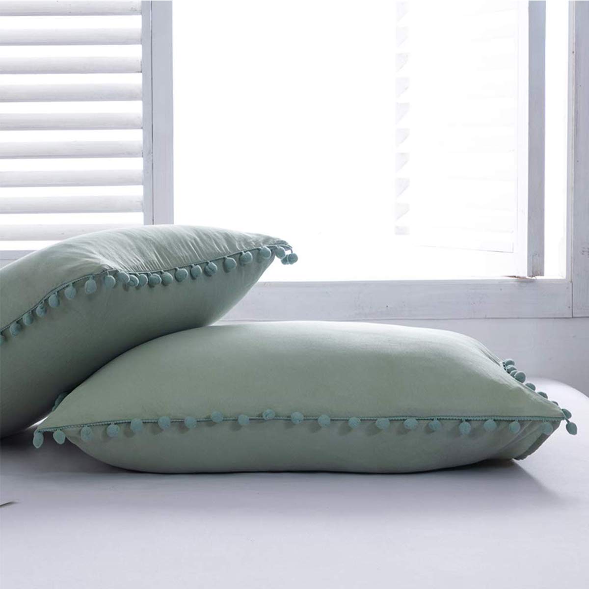 Sue&Joe 100% Washed Cotton Pom Pom Pillow Shams 2 Pack - Queen Size 18.9x29.1 Inches Decorative Pillow Covers for Bedroom, Sofa & Couch - Soft Green Bohemian Style Home Decor
