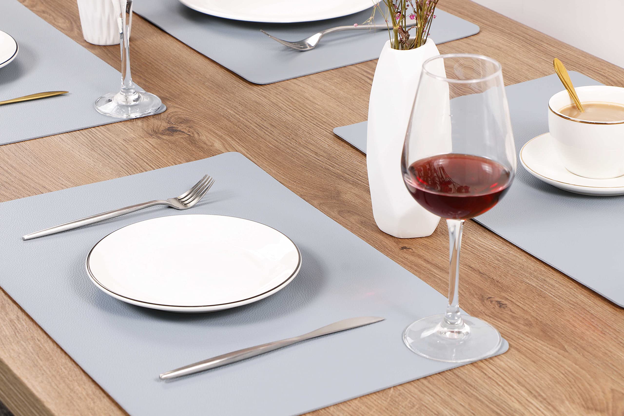 Premium Wipeable Leather Placemats Set of 4 - Waterproof, Heat-Resistant & Easy to Clean Table Mats for Dining & Kitchen Use - Pale Blue Home Decor for Everyday Meals & Dinner Parties