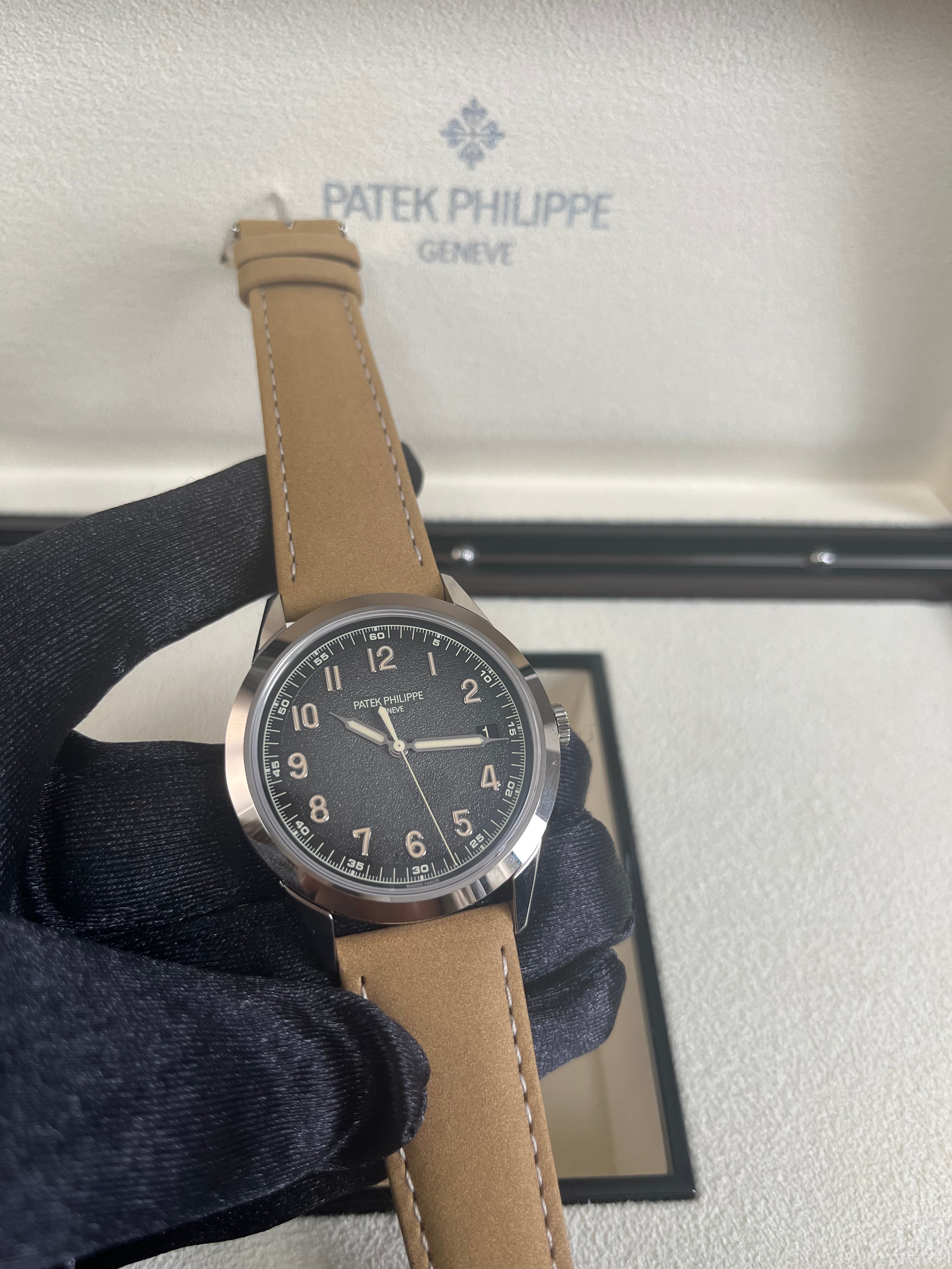 Patek Philippe Calatrava 5226G-001 40mm Men's Luxury Watch - 18K White Gold Case with Textured Dial - Perfect for Business Meetings & Formal Occasions