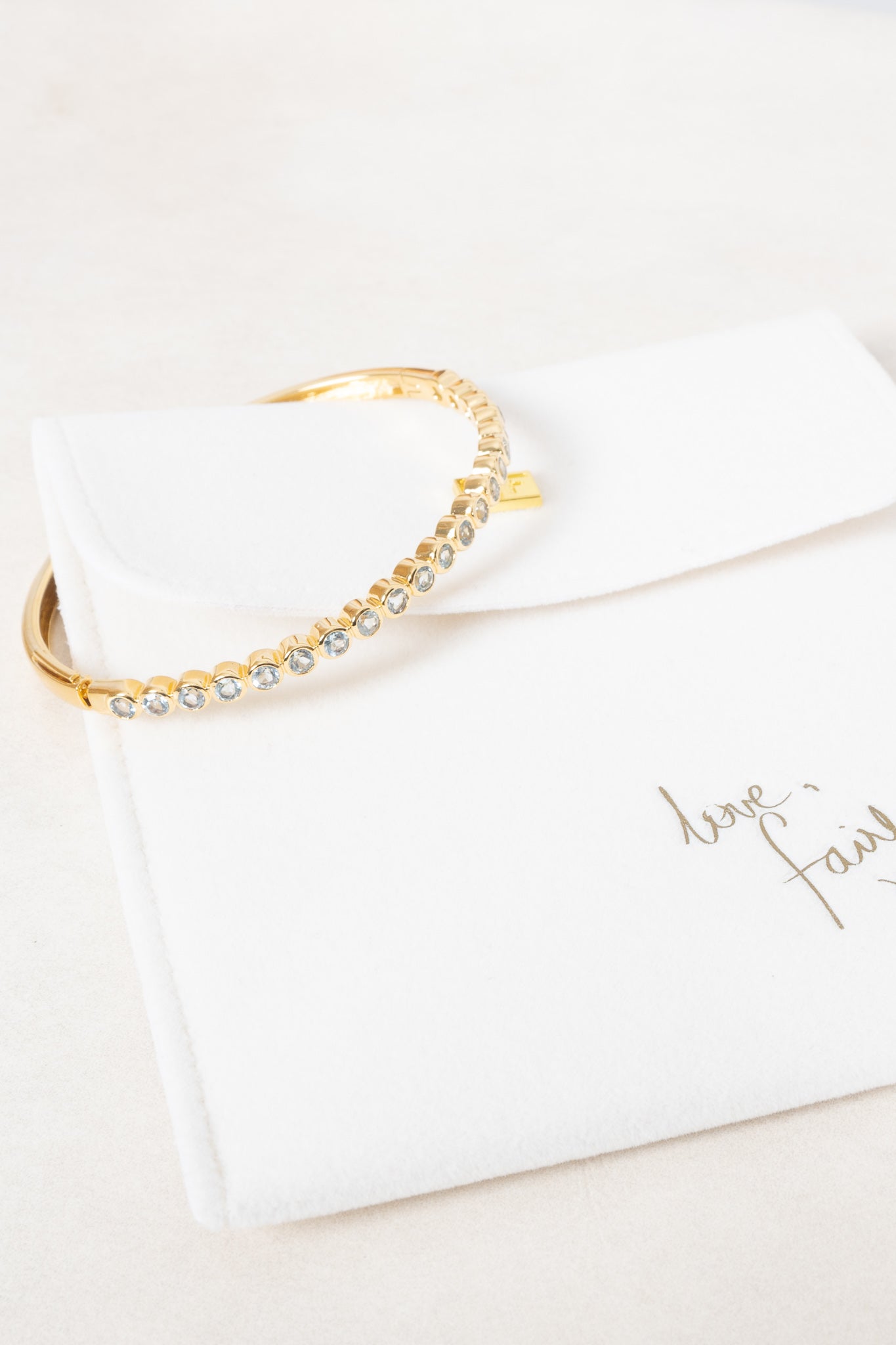 FAIRLEY Blue Topaz Bangle Bracelet - Elegant Sterling Silver Jewelry for Women - Perfect for Weddings, Parties & Special Occasions