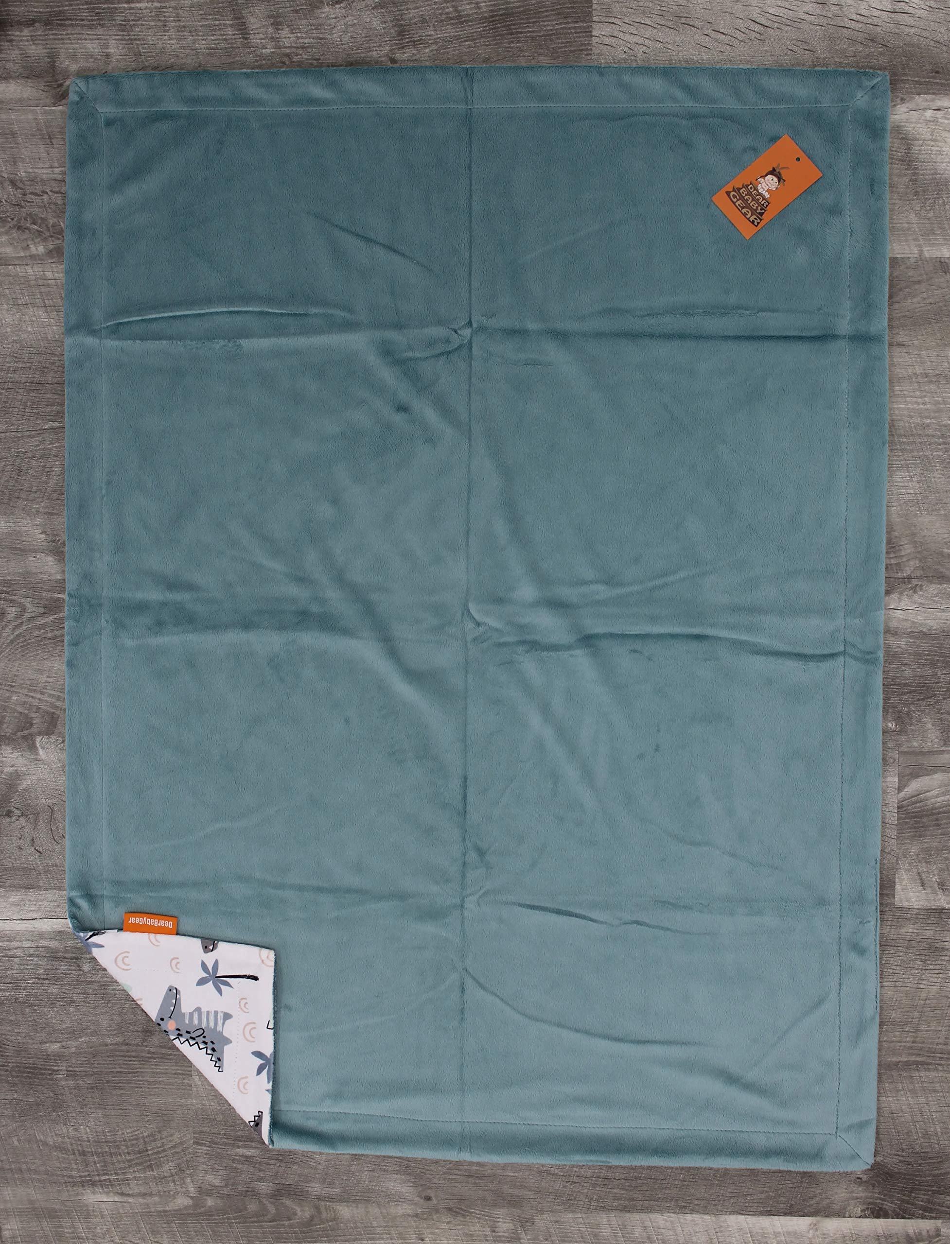 Dear Baby Gear Deluxe Baby Blanket - Soft Reversible Unisex Blanket for Newborns & Infants - Double Layer Crib Bedding Decor (Dinosaur & Palm Tree Print, Blue/Green, 40x30 Inches) - Perfect for Nursery, Stroller & Swaddling