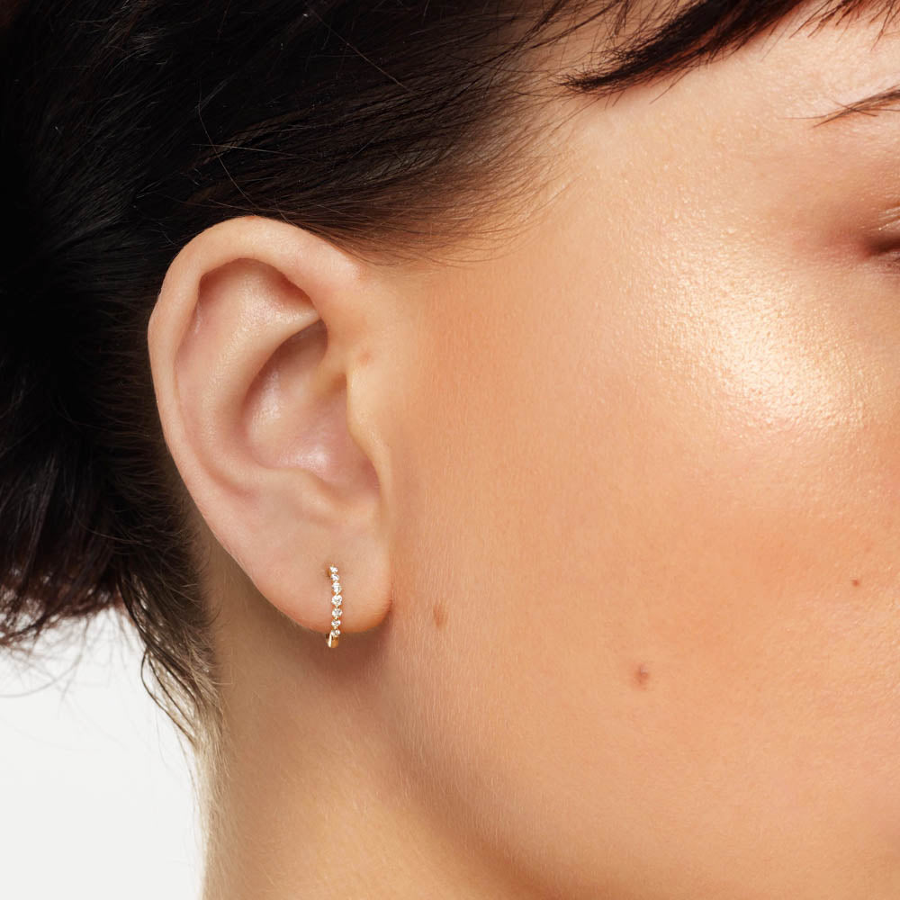 10K Gold Graduated Diamond Huggie Hoop Earrings - Elegant Everyday Wear for Women