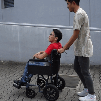Lightweight Portable Wheelchair & Pushchair for Adults - Foldable Travel Wheelchair with Removable Footrest - Ideal for Air Travel, Shopping, and Outdoor Activities
