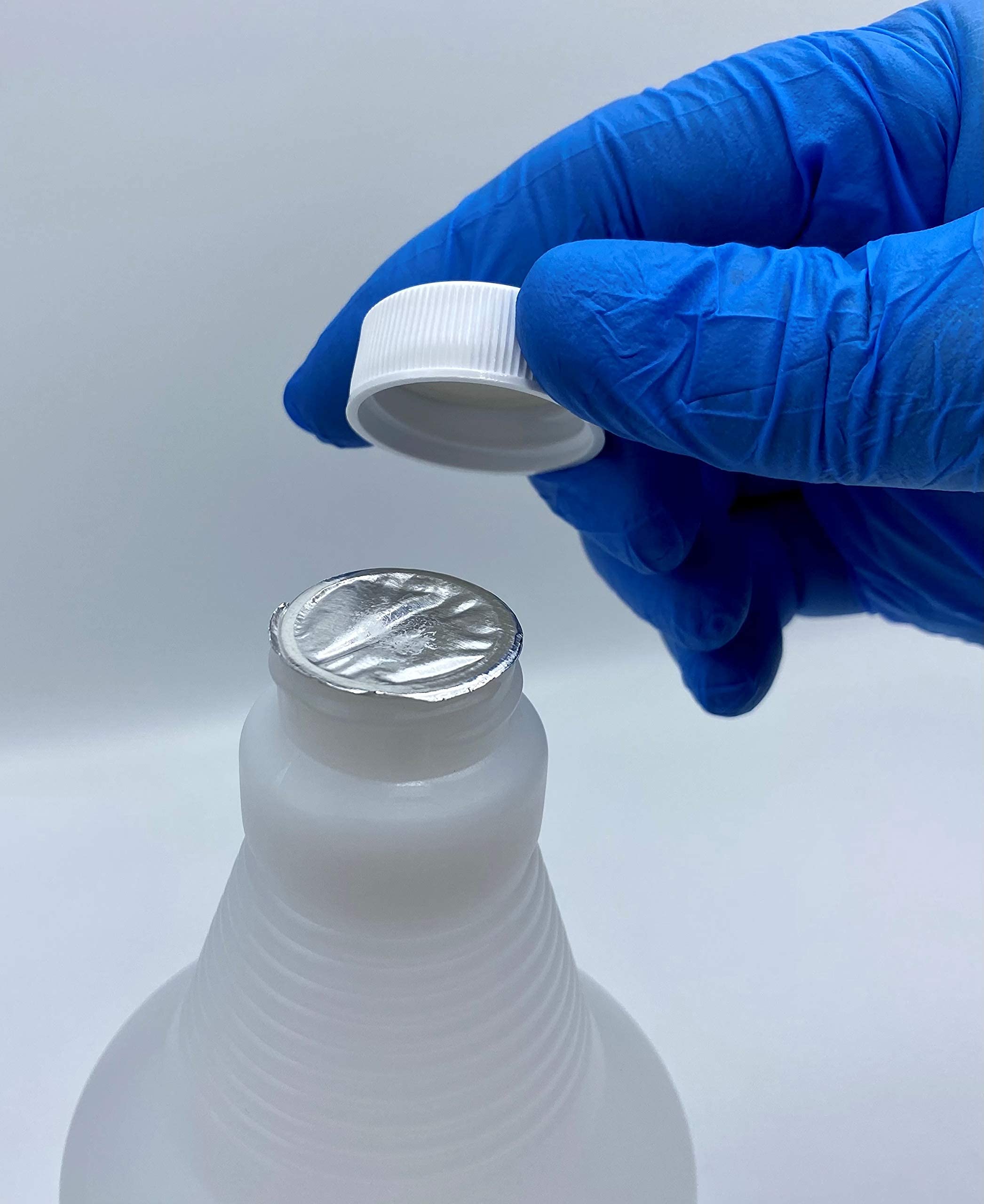 **70% Isopropyl Alcohol USP Grade - 16 x 1000ml Bottles (4+ Gallons) - Includes 4 Mini Spray Bottles (2oz Each) - Made in USA - Ideal for Cleaning, Disinfecting & First Aid**