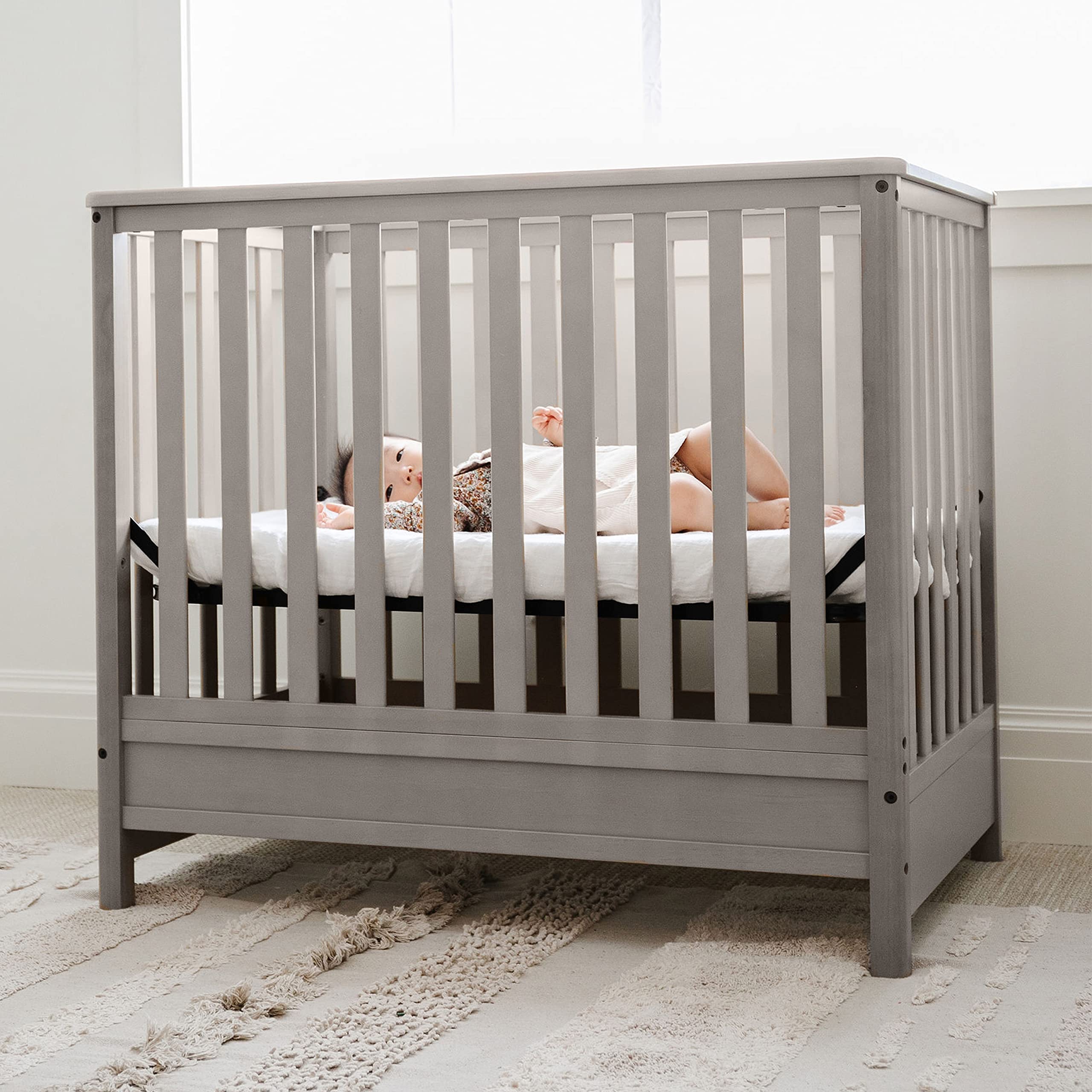 Storkcraft 5-in-1 Convertible Mini Crib with Bonus 2.75