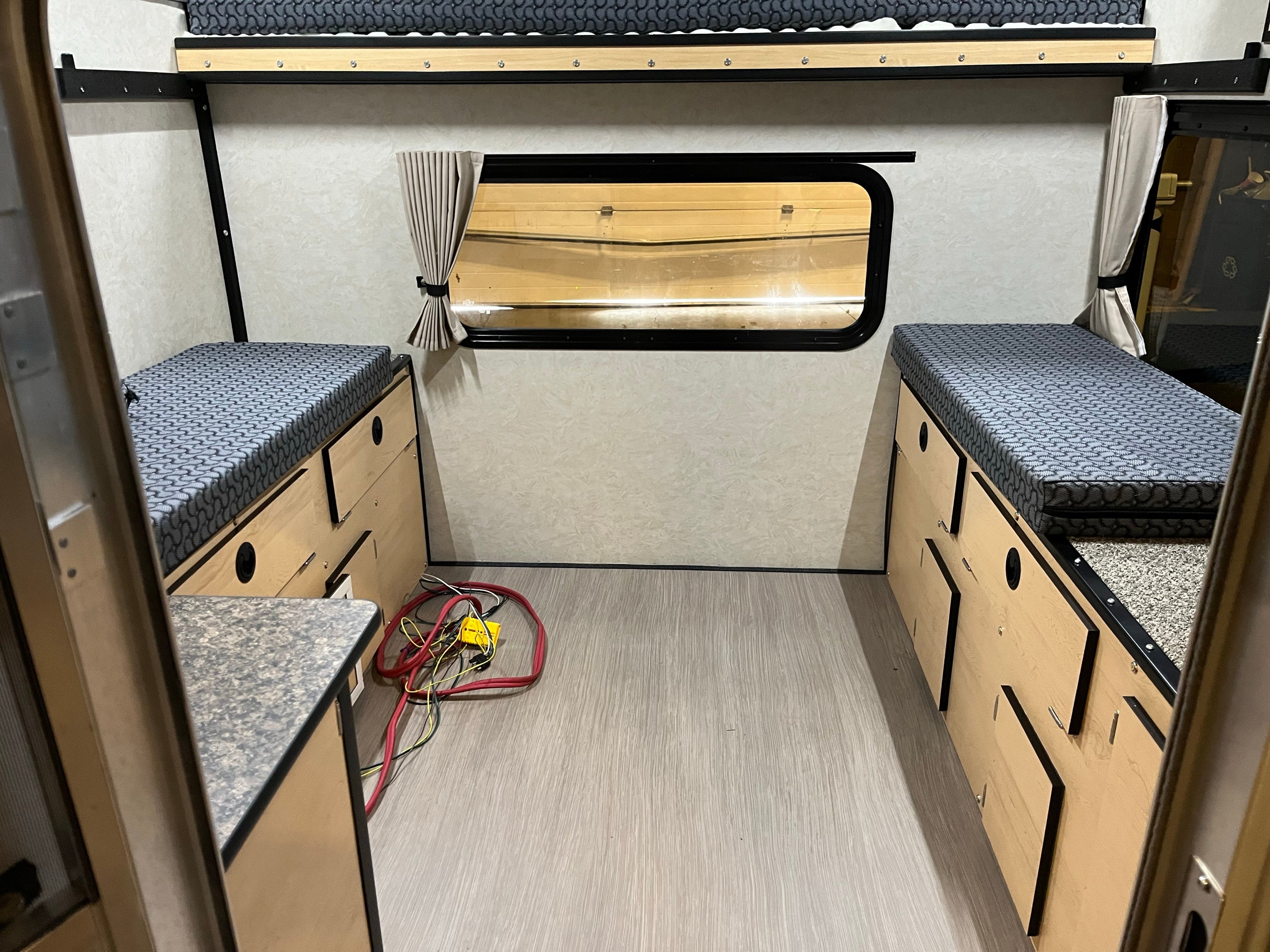 2023 Raven Base Four Wheel Camper - Used | Lightweight Pop-Up Truck Camper for Off-Road Adventures | Perfect for Camping, Overlanding & Outdoor Exploration