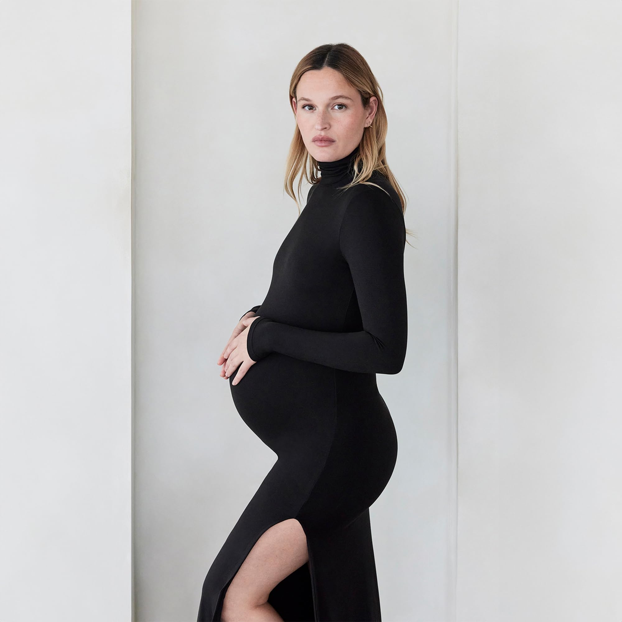 BUMPSUIT Maternity Maxi Dress with Thigh High Slit - Soft Stretchable Long Sleeve Turtleneck Bodycon Pregnancy Dress for Women - Perfect for Baby Showers, Maternity Photos & Special Occasions