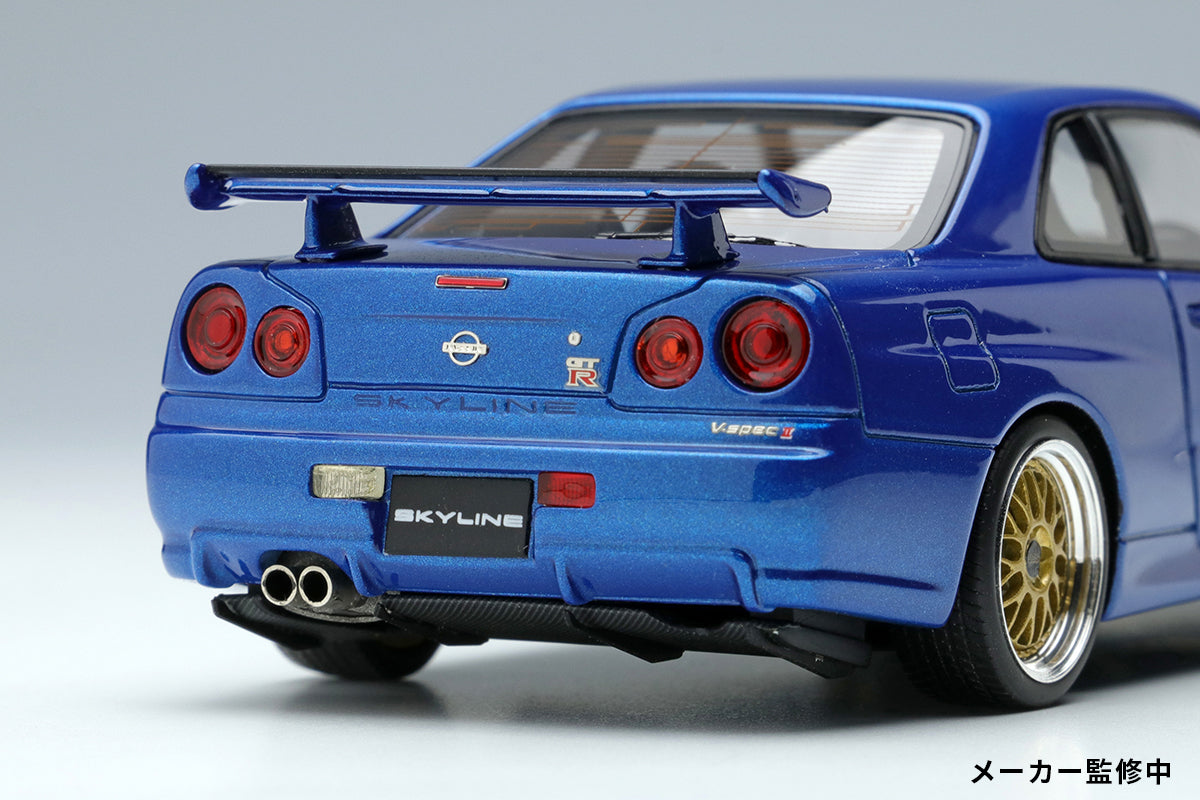 PREORDER Make Up Co., Ltd Eidolon 1:43 Scale Nissan Skyline GT-R (BNR34) V Spec II 2000 Model Car with BBS LM Wheels in Bayside Blue - Perfect for Collectors, Display, and Diecast Enthusiasts