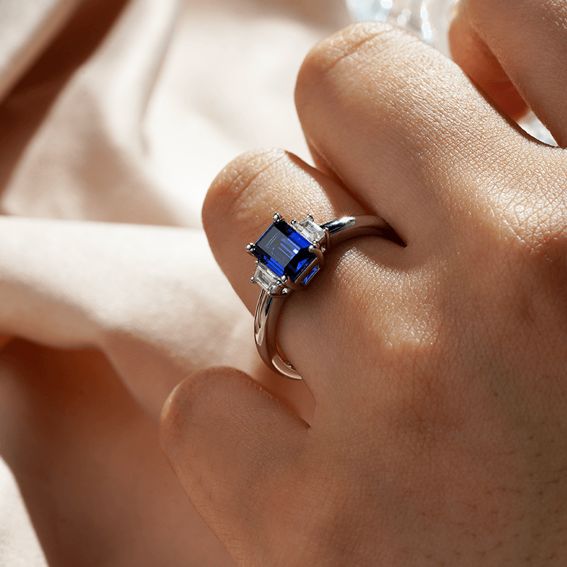 Exquisite Emerald Cut Blue Sapphire & White Sapphire Three Stone Ring – Elegant Jewelry for Engagement, Wedding & Special Occasions
