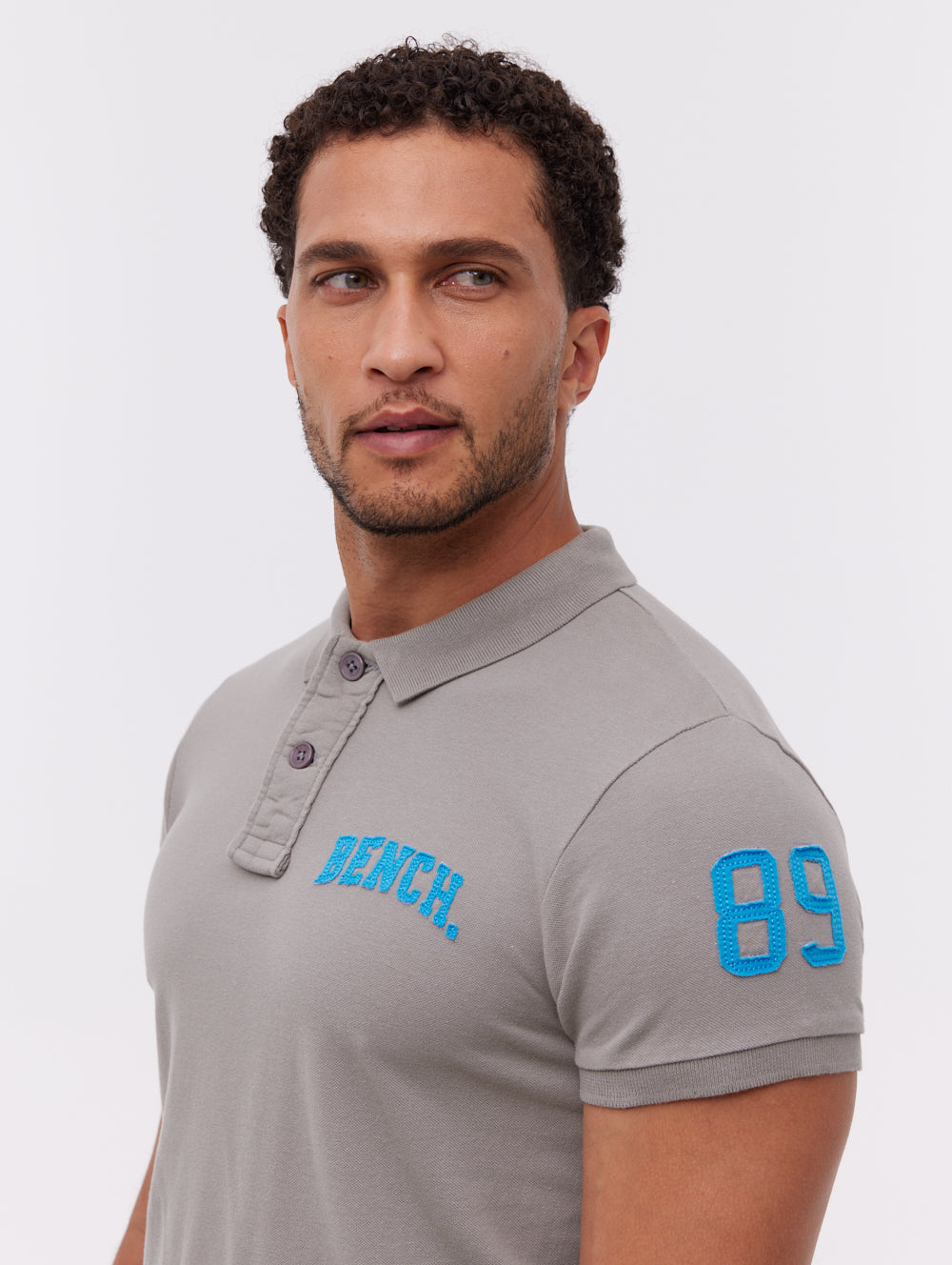 Duchal Collegiate Appliqué Polo Shirt for Men & Women - Stylish Embroidered Casual Golf Shirt - Perfect for School, Work, and Outdoor Activities