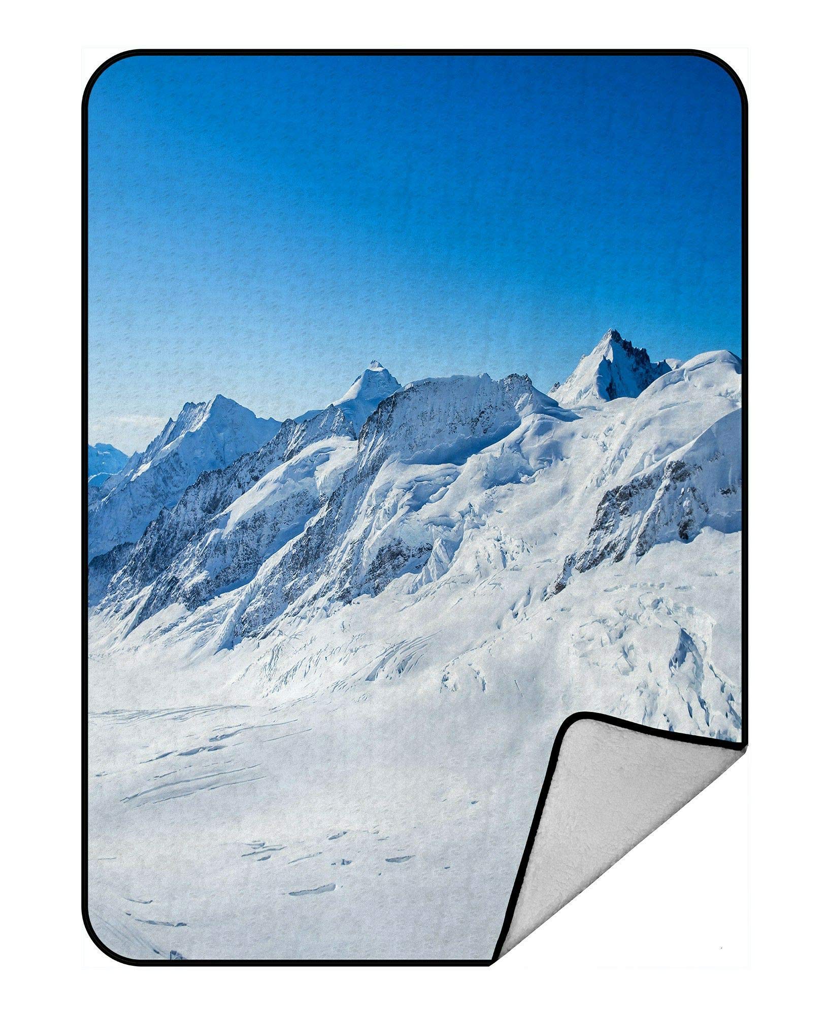 A Cozy Winter Tale: The Magic of the Switzerland Winter Snow Mountain Fleece Throw Blanket