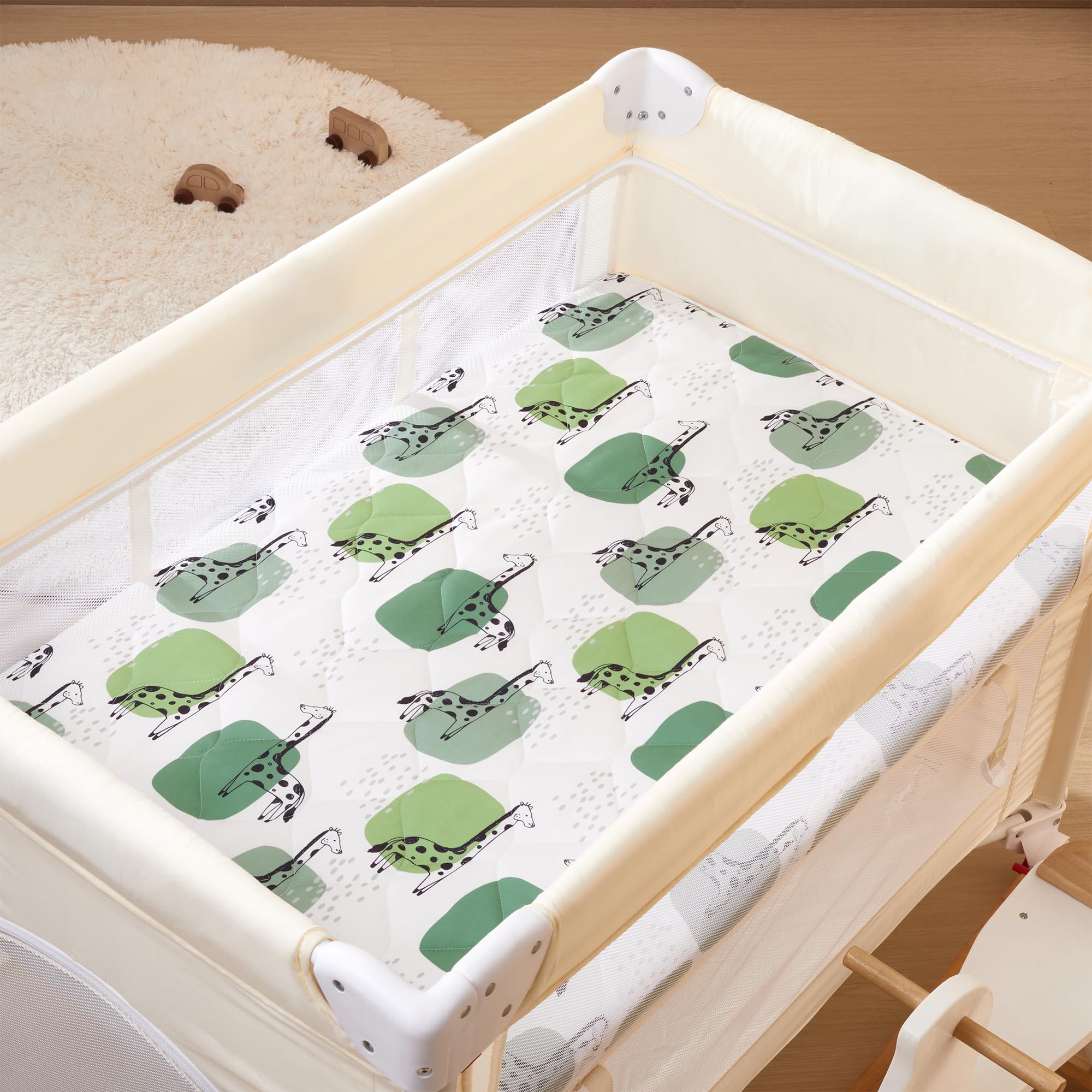 TILLYOU Pack and Play Sheet - Soft Quilted Crib Cover Pad, Toddler Mattress Protector with 1-3 Inch Deep Pocket, Thick Play Yard Playpen Sheet for Baby Crib - 39x27 Inches, Green Giraffe Print - Perfect for Nursery, Daycare & Travel Use
