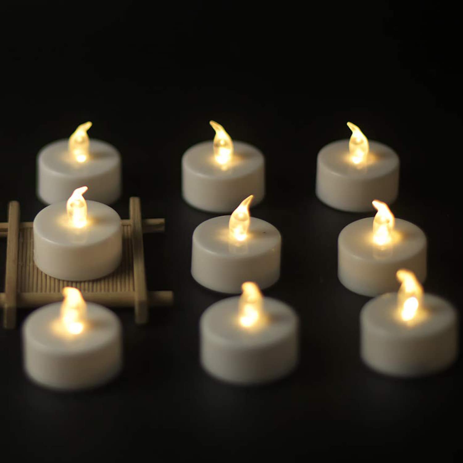 YIWER 12-Pack LED Tea Light Candles - 200 Hours Battery Operated Flameless Candles in Warm White for Weddings, Parties, Home Decor & Romantic Ambiance