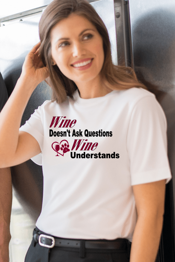 Wine Doesn't Ask Questions Ladies T-Shirt - Funny Wine Lover Gift for Women - Pink T-Shirt with Black Lettering - Perfect for Wine Parties & Girls Night Out
