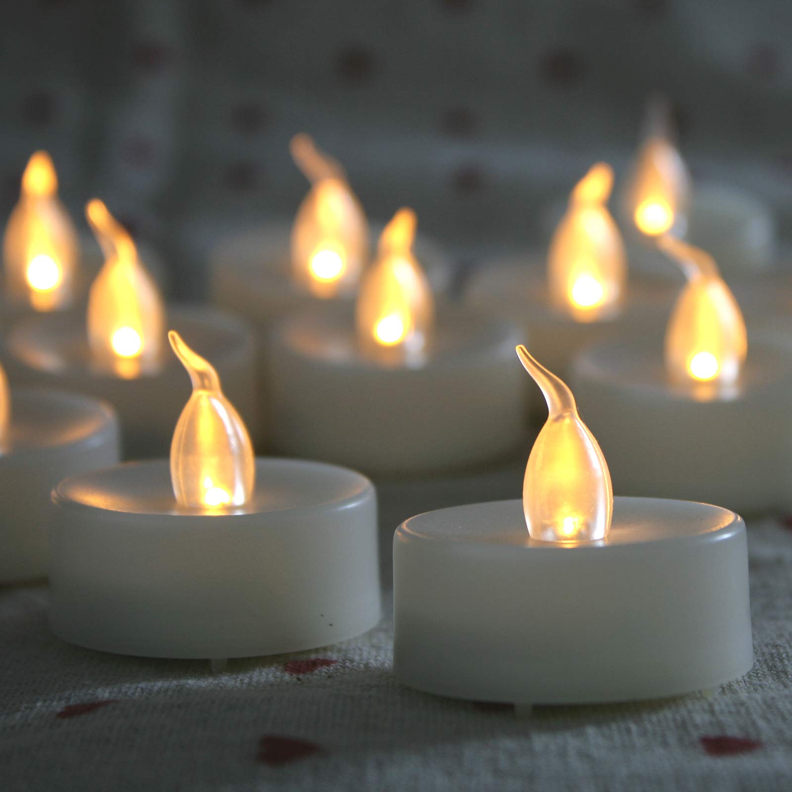 Battery Operated Flameless LED Tea Lights - Realistic Flickering Electric Candles (12 Pack) for Wedding, Party, Halloween & Christmas Decor - Perfect for Table Centerpieces, Votives & Home Ambiance