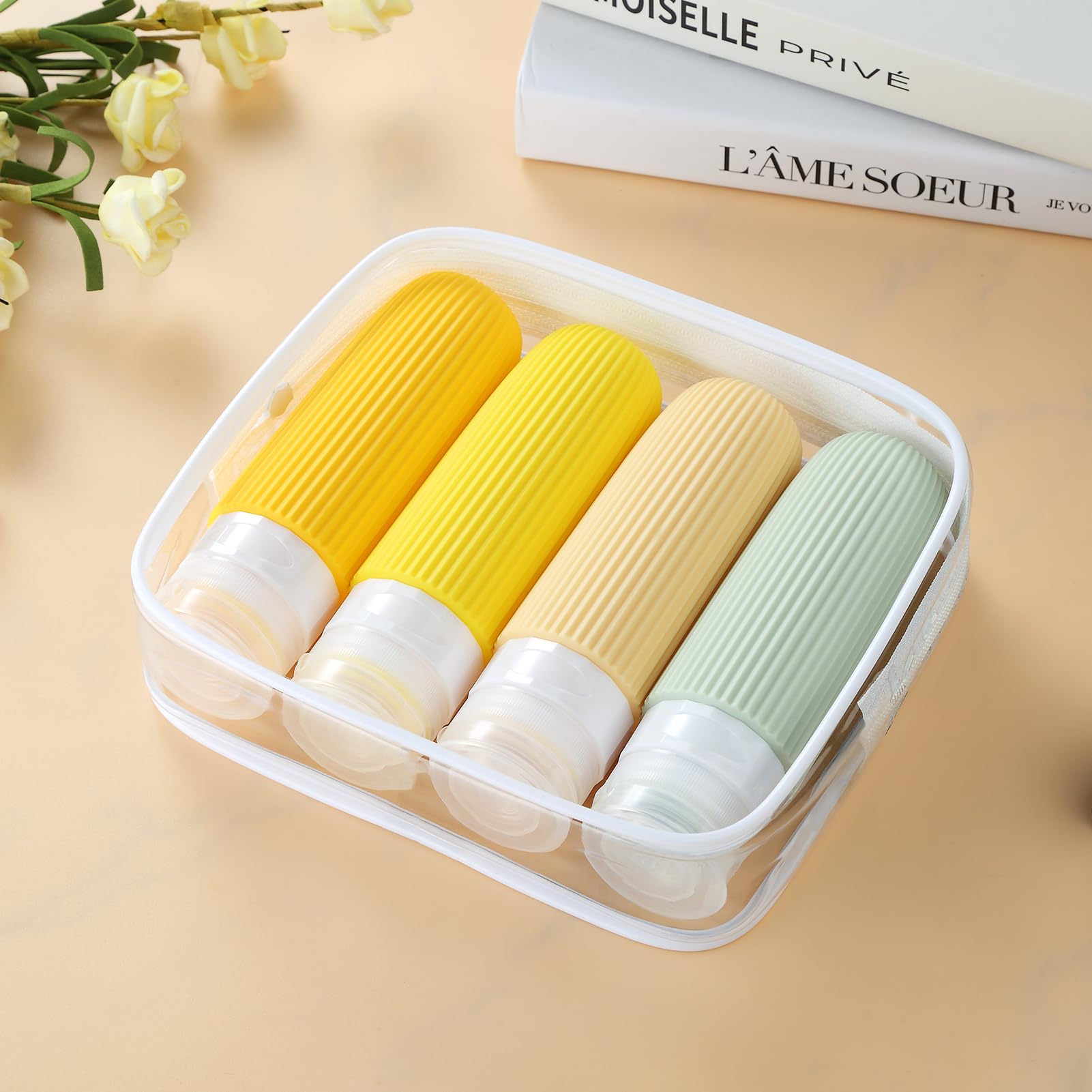 TSA Approved 3oz Travel Bottles for Toiletries - 4 Pack Leak Proof Squeezable Silicone Containers with Clear Toiletry Bag | BPA Free Portable Travel Accessories for Shampoo, Lotion & Cosmetics | Perfect for Airplane Carry-On, Gym & Vacation Essentials