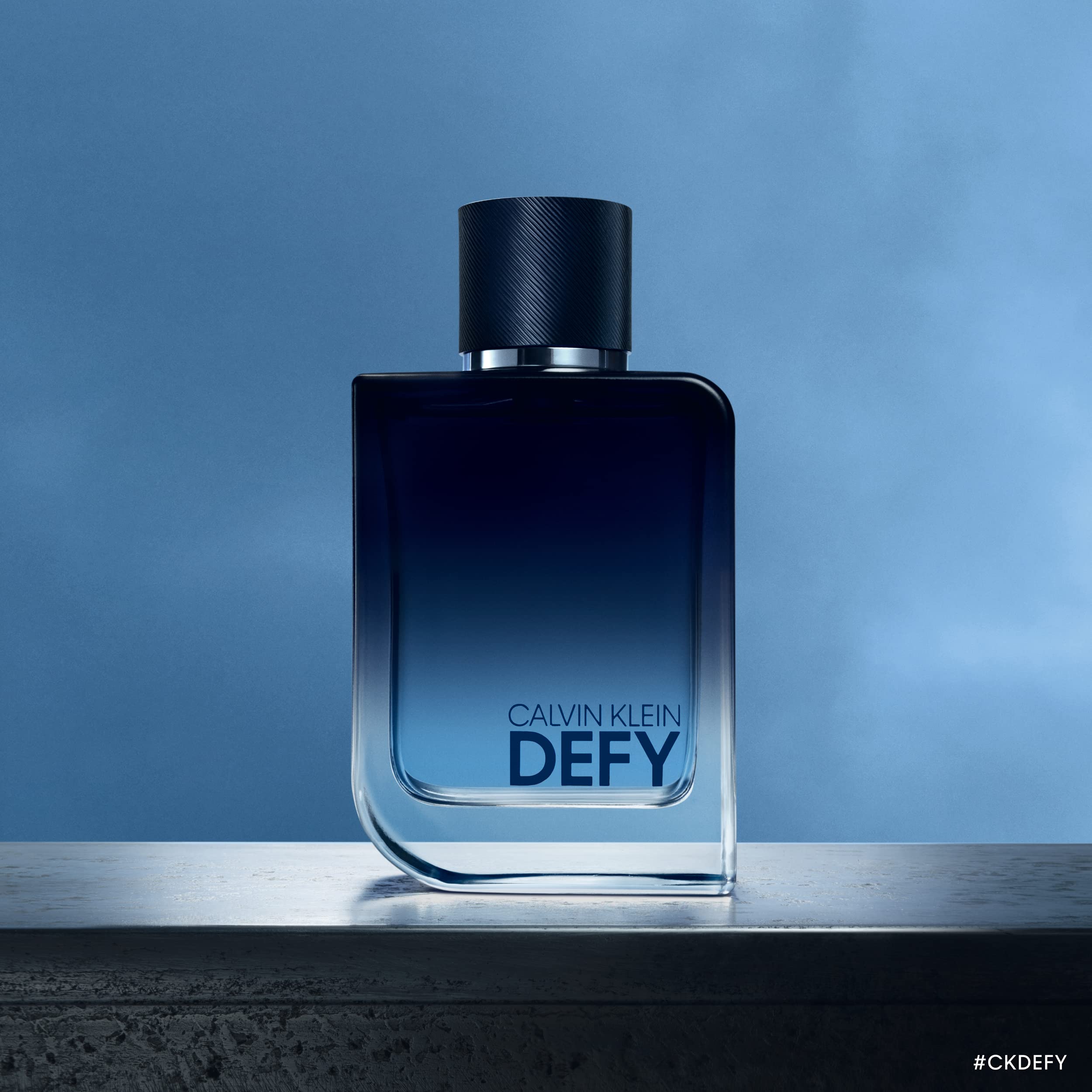 Calvin Klein Defy Eau de Parfum for Men - Woody Leather Cologne with Mandarin Oil, Leather Accord & Vetiver - Long Lasting Fragrance - Perfect for Date Night, Office & Special Occasions