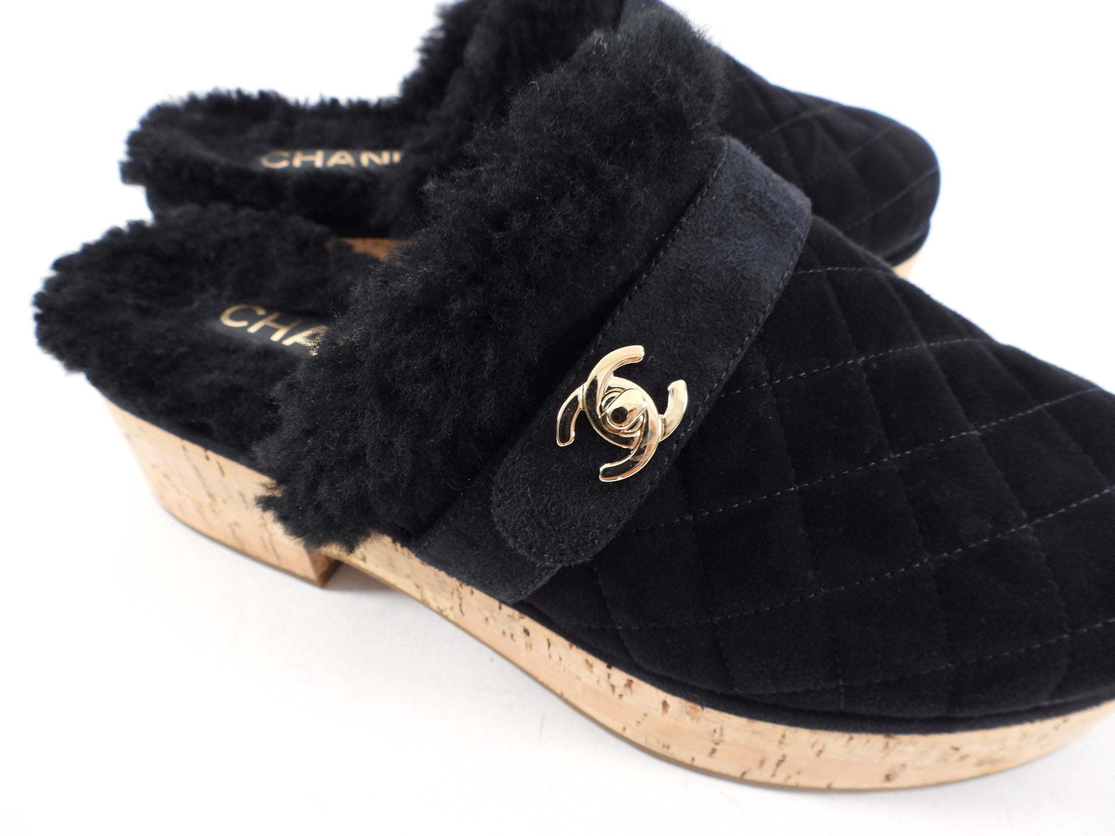Chanel 21A Black Shearling CC Turn Clasp Quilted Cork Mules Size 37 - Luxury Designer Slides for Women | Perfect for Casual Outings, Date Nights & Fashionable Comfort