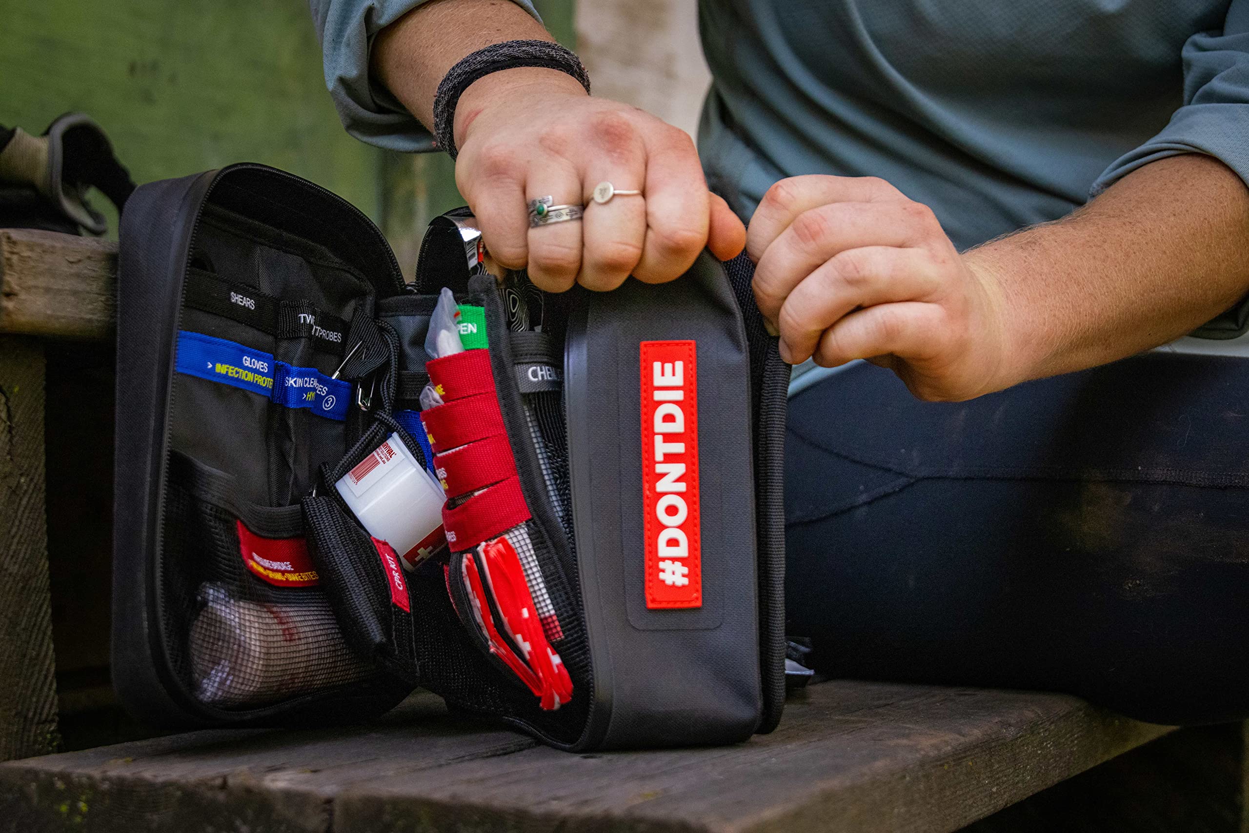 Uncharted Supply Co. First Aid Plus Kit - Waterproof Emergency Medical Bag for Travel, Hiking, Camping, Car & Home - Survival Gear with Essential Supplies & Tools - Black - Perfect for Outdoor Adventures & Emergency Preparedness