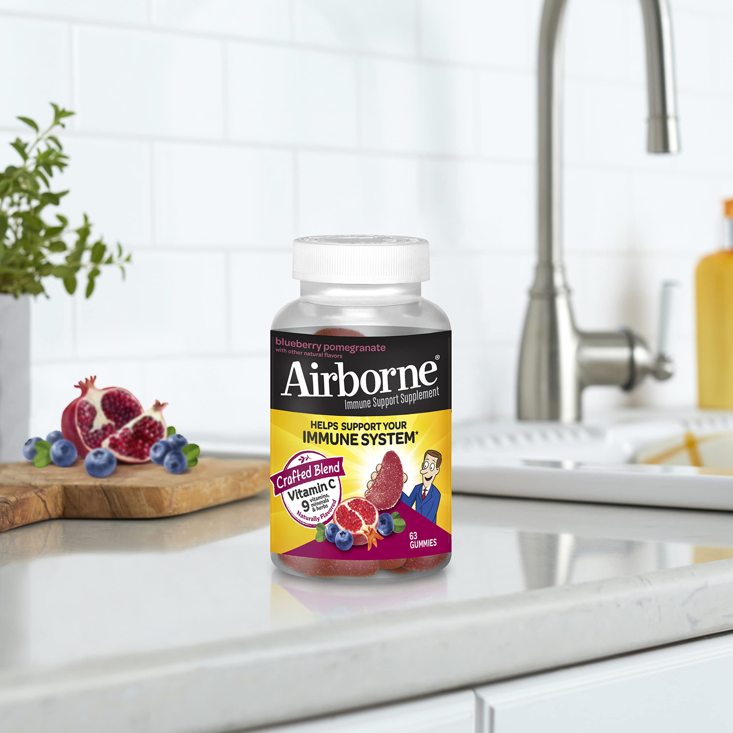 Airborne 750mg Vitamin C Gummies for Adults - Immune Support Supplement with Antioxidants Vitamins A, C & E - 63 Count Blueberry Pomegranate Flavor Gummy Vitamins - Boost Immunity & Energy for Workouts, Travel & Daily Wellness