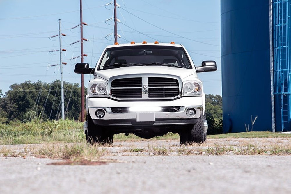 100W 20-Inch LED Light Bar with Bumper Mounting Bracket & Wiring Harness - Compatible with 2003-2018 Dodge RAM 2500 3500 Pickup Trucks - Perfect for Off-Roading, Night Driving, and Work Site Lighting