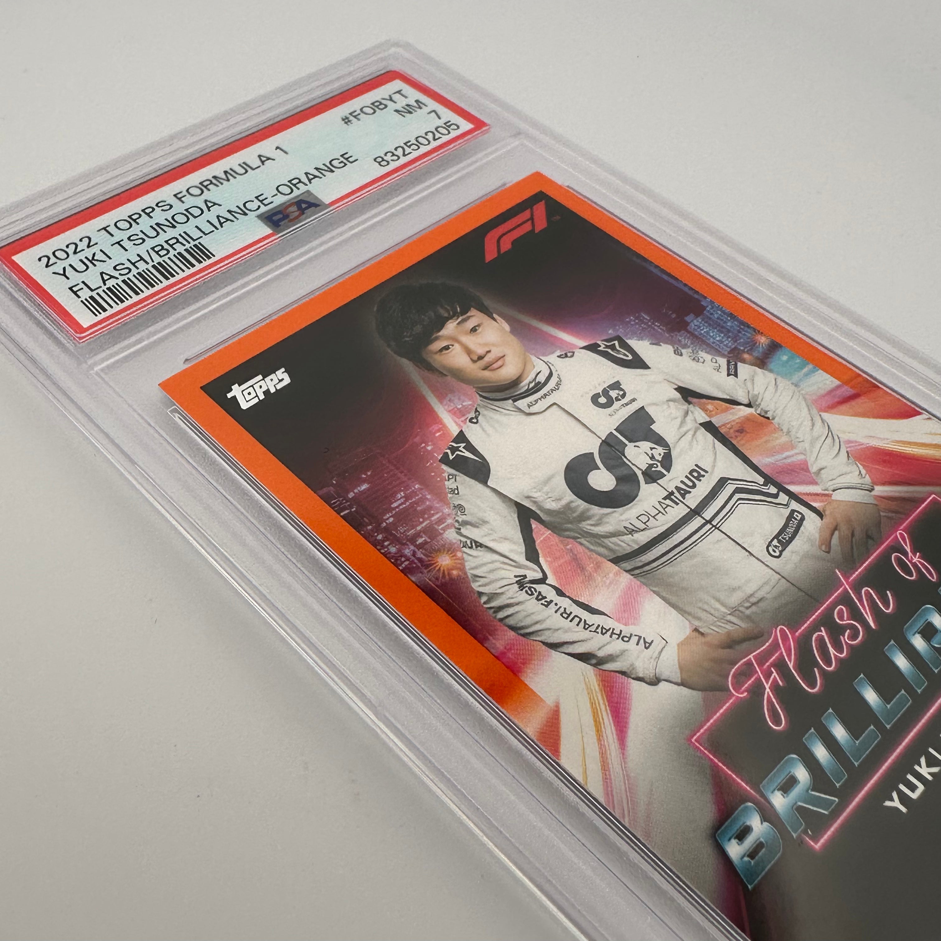 PSA 7 Graded 19/25 Yuki Tsunoda Flash Of Brilliance Orange F1 Racing Card - Perfect for Collectors & Formula 1 Fans Display