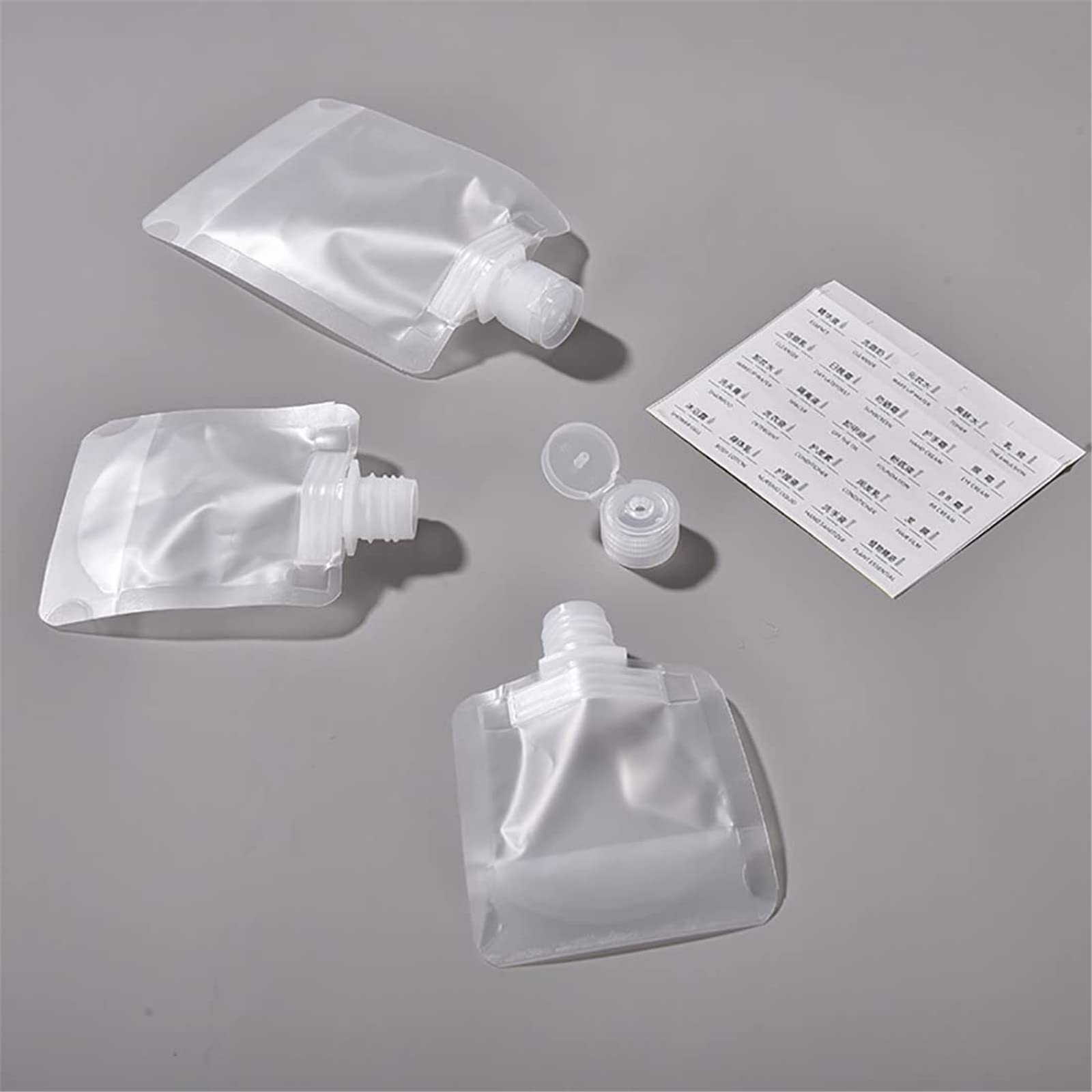 **Leak-Proof Refillable Travel Makeup Pouch - 100ml Transparent Squeeze Cosmetic Bag (9-Pack) - Portable Clamshell Packaging for Liquids, Creams & Toiletries - Perfect for Air Travel, Gym & On-the-Go Touch-Ups**