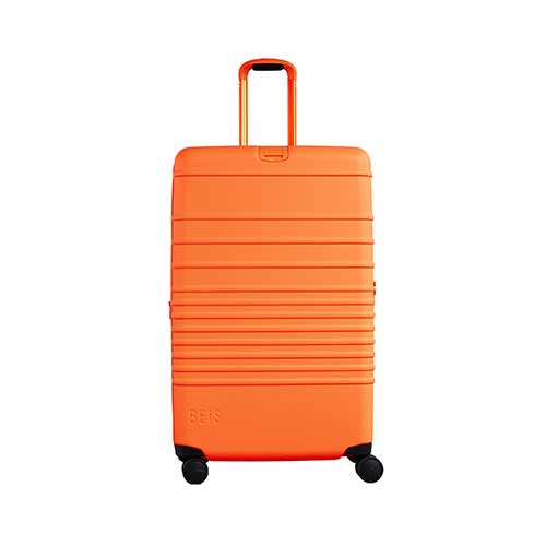Large Check-In Roller Suitcase in Creamsicle - Spacious & Durable Travel Luggage for Airlines, Vacations & Business Trips