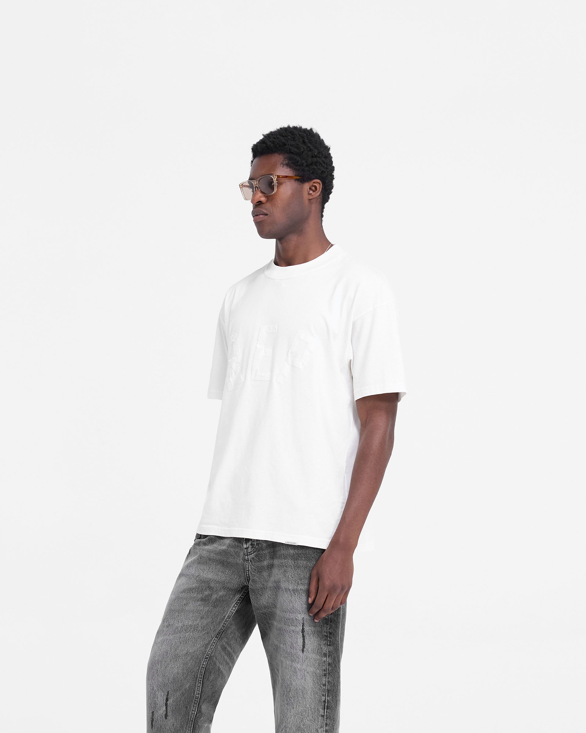 Rep Applique T-Shirt - Flat White | Trendy Graphic Tee for Casual Wear & Street Style Outfits