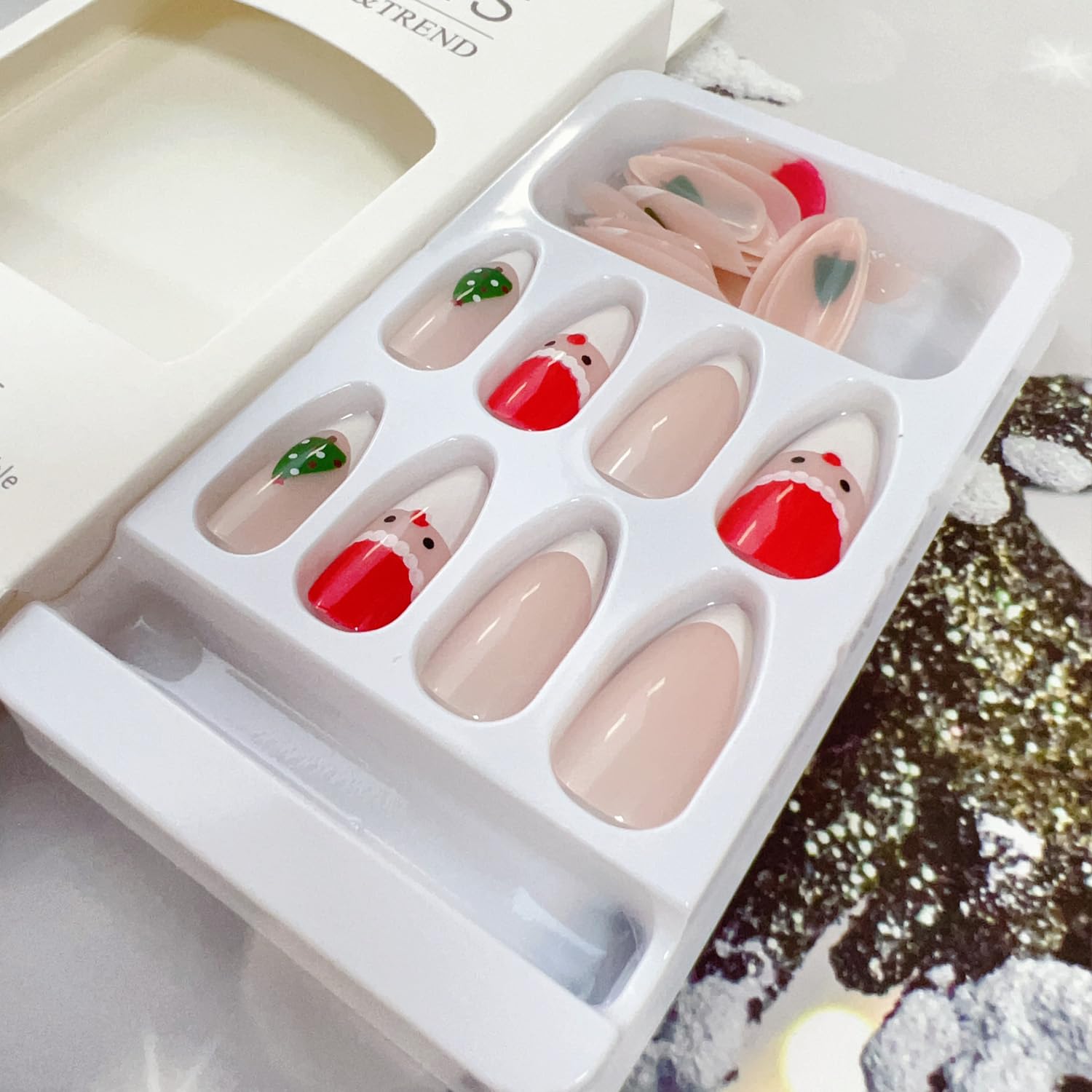 Christmas Press on Nails - 24Pcs Almond Shaped Fake Nails with Santa Claus, Snowflake & Christmas Tree Designs, French Tip Glue on Nails for Women Holiday Manicure - Perfect for Parties, Gifts & Festive Nail Art