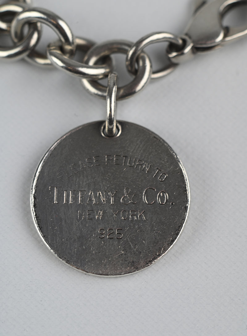 Tiffany & Co. Sterling Silver Bracelet with Round Charm - Elegant Jewelry Gift for Women, Perfect for Anniversaries & Special Occasions