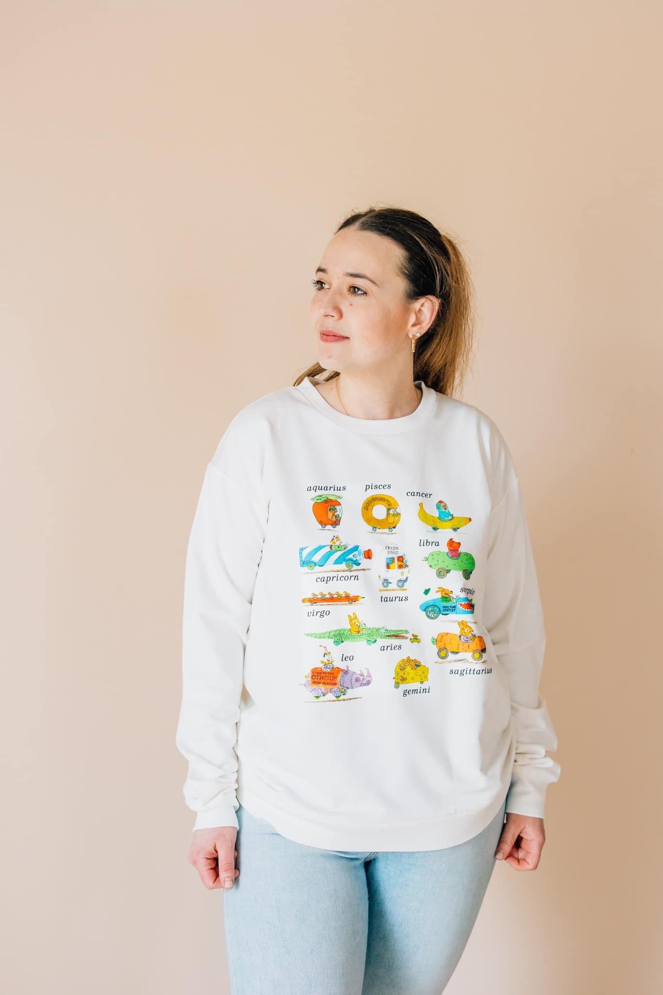 Richard Scarry's Busyworld™ Zodiac Themed Adult Sweatshirt | Comfortable Pullover Hoodie for Men & Women | Perfect for Casual Wear, Gifts & Zodiac Enthusiasts