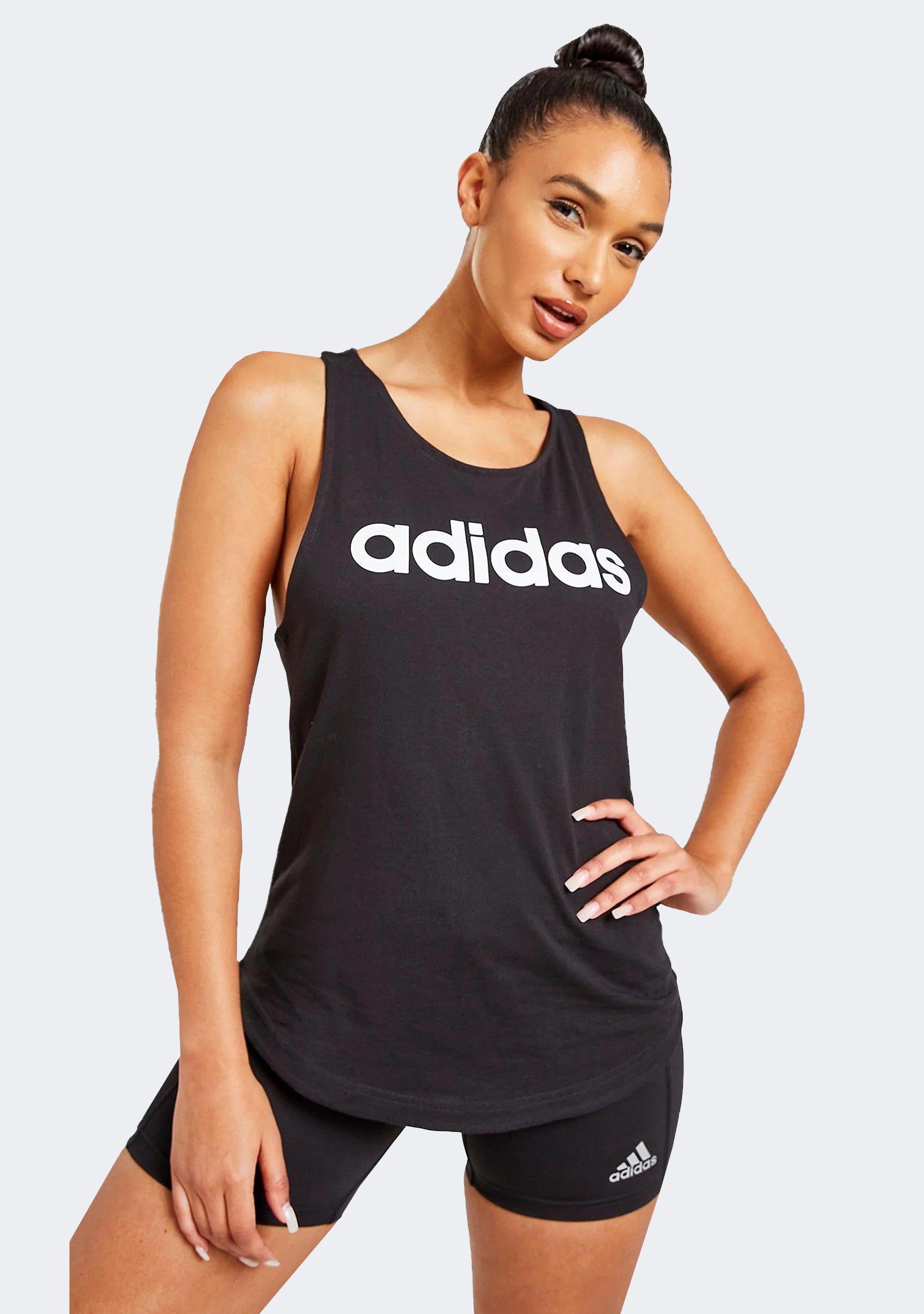 Adidas Women's Essentials Loose Fit Logo Tank Top - Breathable Workout Shirt for Running, Yoga & Gym - Comfortable Athletic Wear for Women
