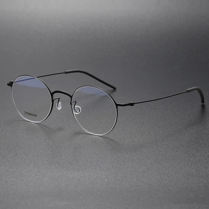 Stylish Black Titanium Full Rim Round Screwless Eyeglasses for Women - Model 65504 | Perfect for Office, Reading & Everyday Wear