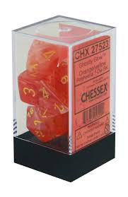 Chessex Polyhedral 7-Dice Set - Ghostly Glow Orange with Yellow Dice for D&D, RPG, and Tabletop Gaming | Perfect for Nighttime Game Sessions