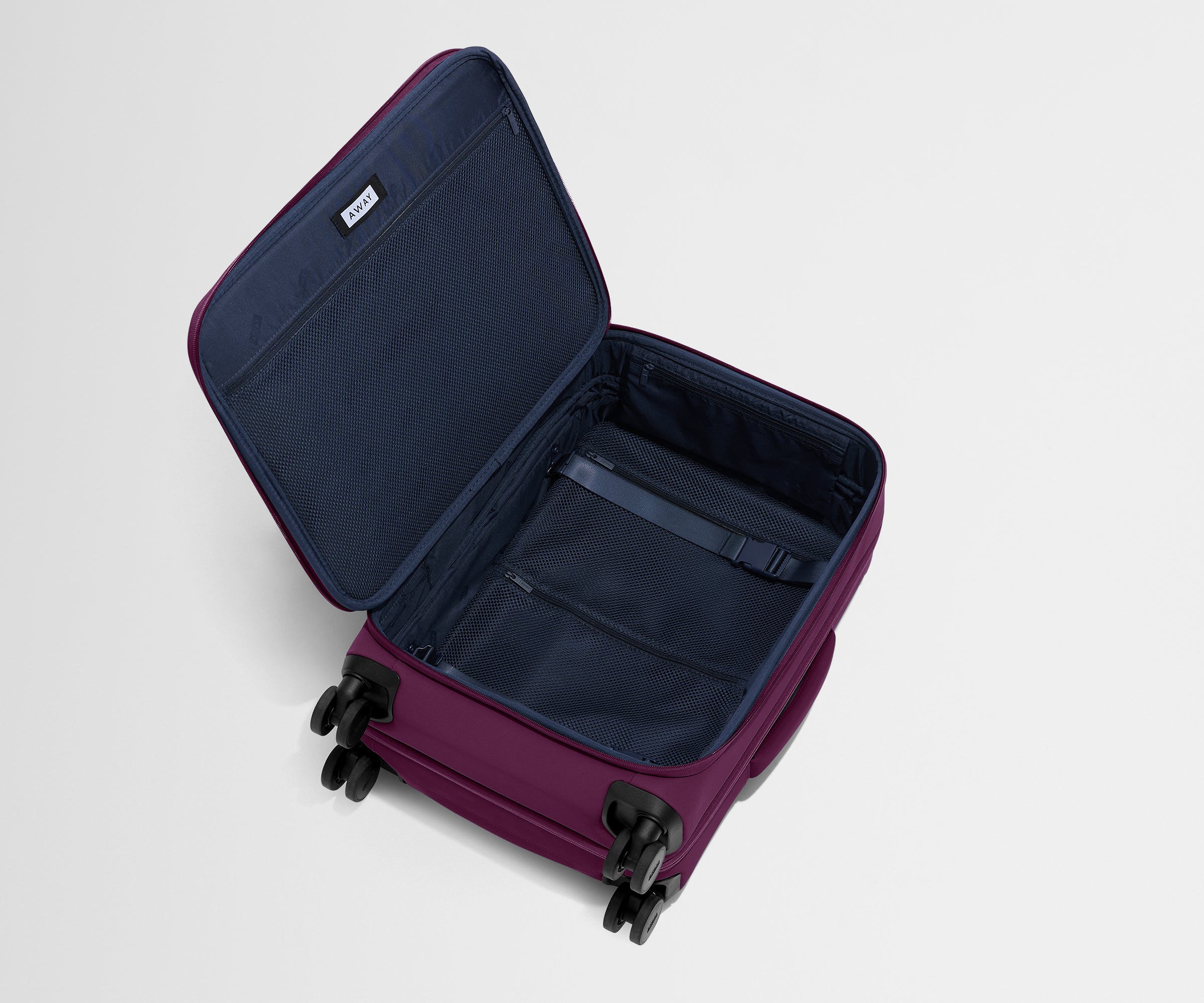 Softside Bigger Carry On Luggage in Plum Purple - Lightweight Expandable Suitcase for Air Travel & Weekend Getaways