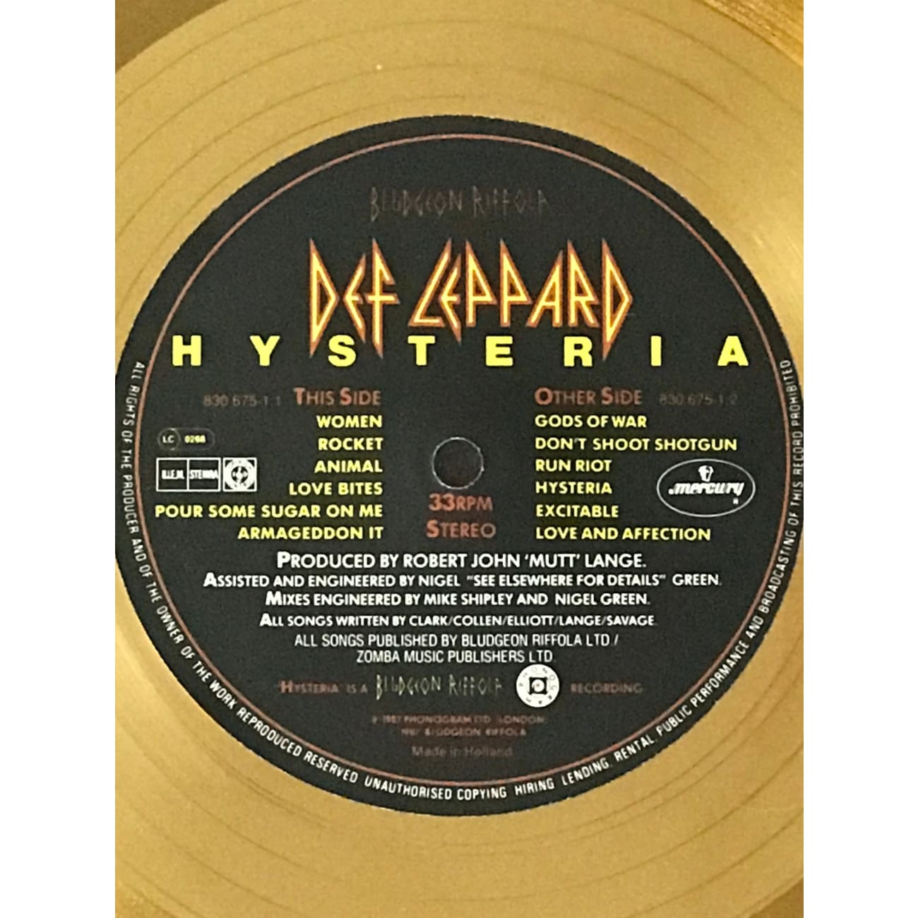 Def Leppard Hysteria Swiss Gold Award Presented to Rick Allen - Rare Collectible Music Memorabilia for Fans & Display in Home, Office, or Music Room