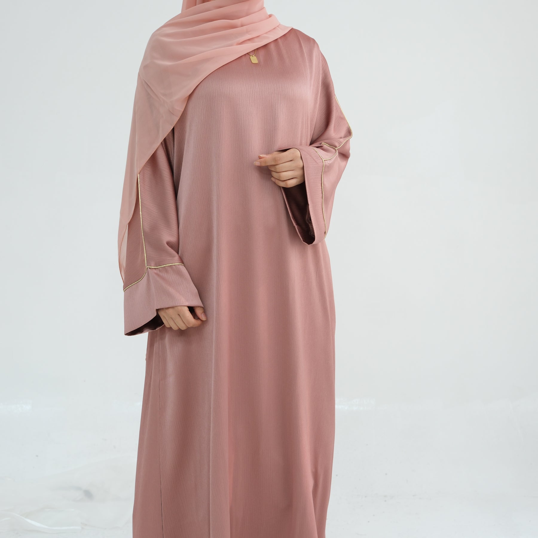 Elegant Ayana Textured Piping Detail Abaya Dress - Pink Modest Islamic Clothing for Women | Perfect for Prayer, Mosque & Special Occasions
