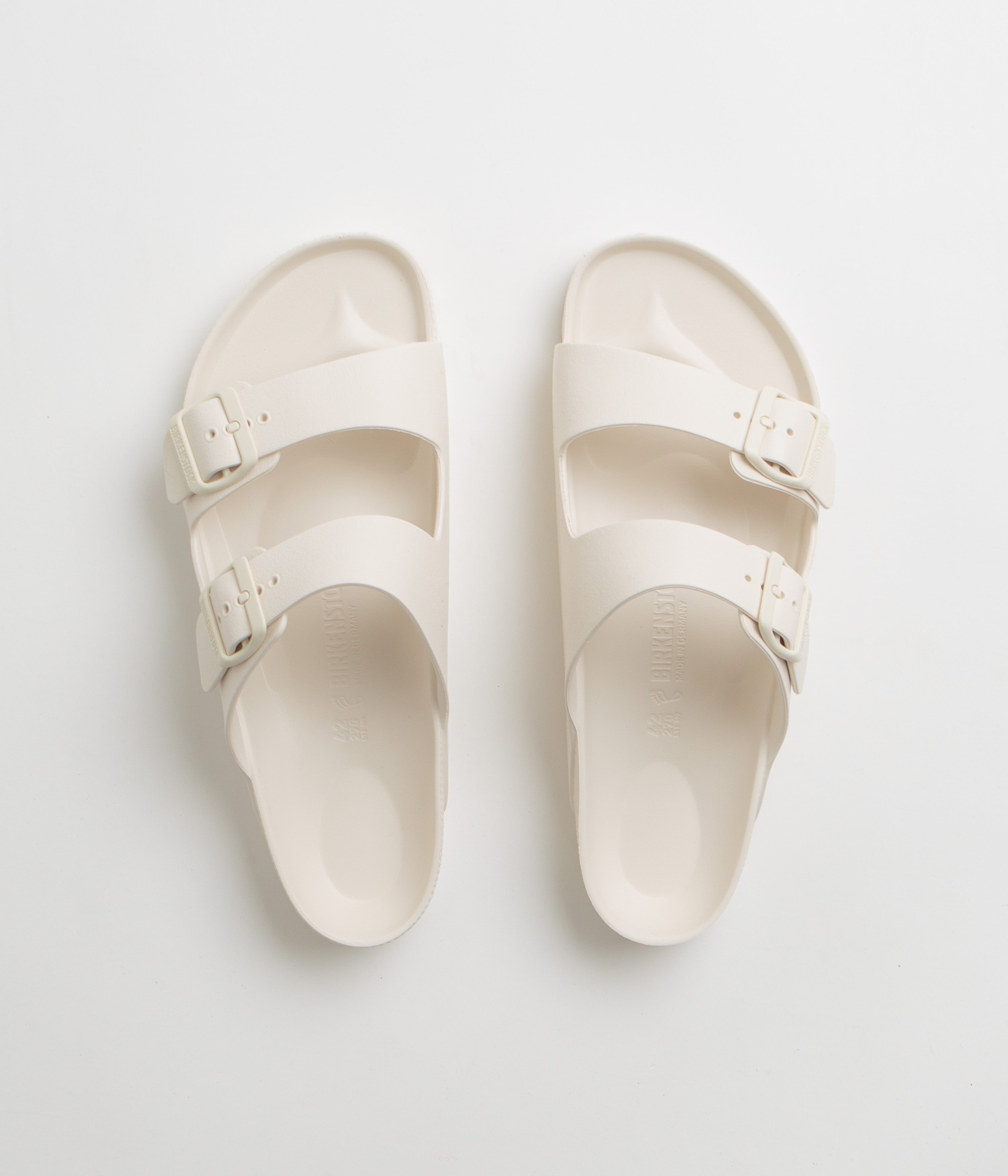 Birkenstock Arizona EVA Sandals for Women & Men - Lightweight Comfortable Slide Sandals in Eggshell White | Perfect for Beach, Pool, Travel & Summer Outdoor Activities