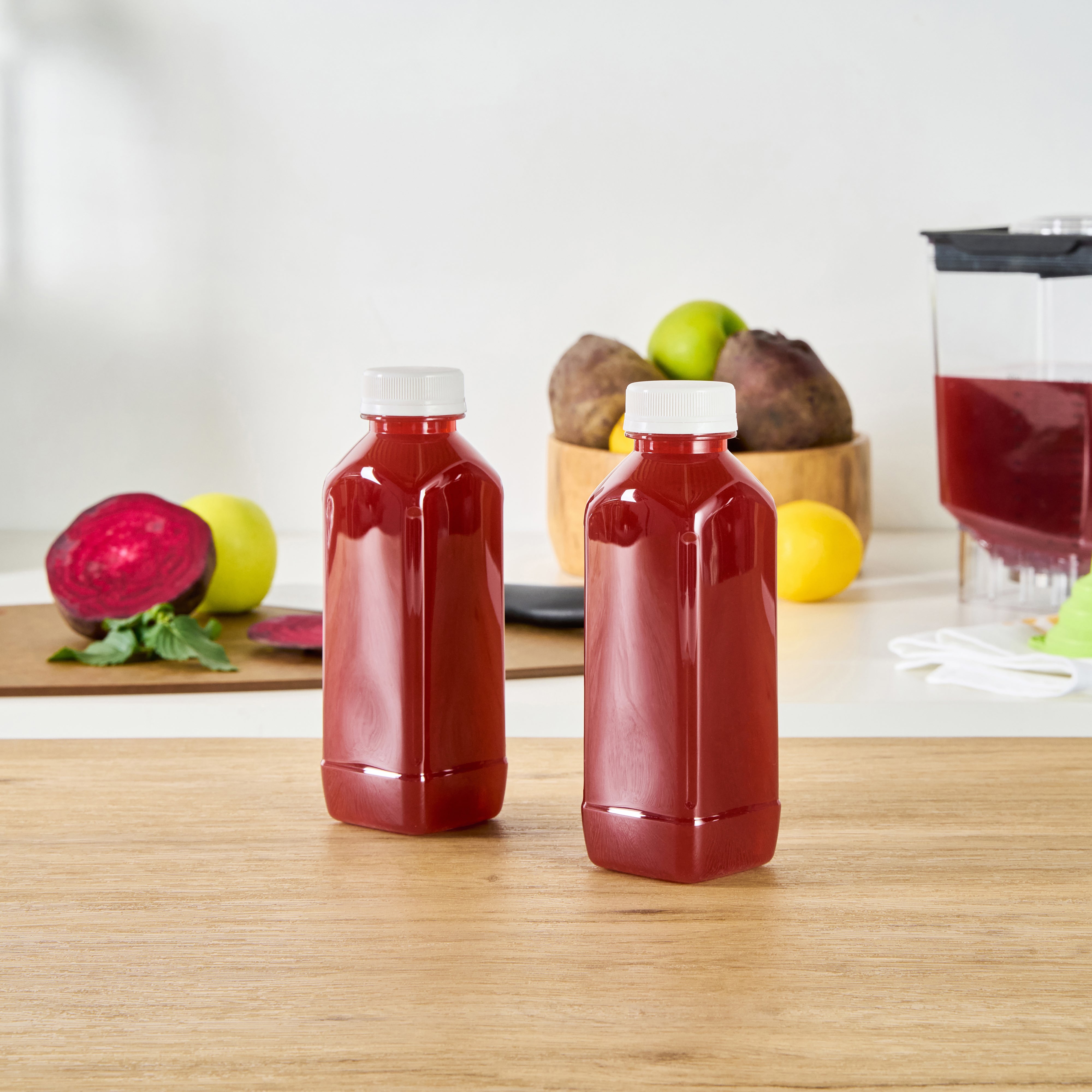 16 oz Square Clear Plastic Cold Pressed Juice Bottles with Safety Cap - 2.25